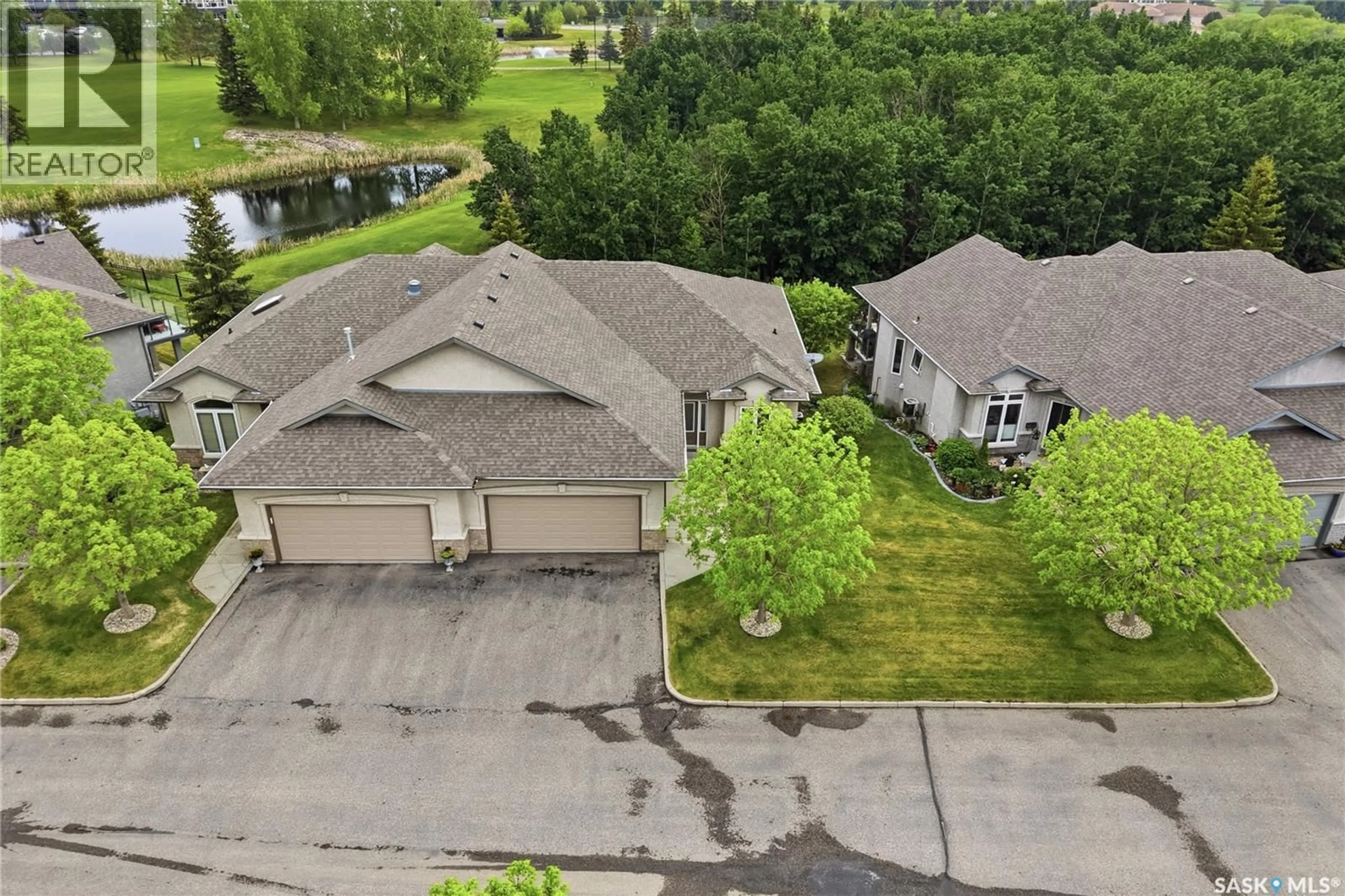 A pic from outside/outdoor area/front of a property/back of a property/a pic from drone, water/lake/river/ocean view for 11 - 301 CARTWRIGHT TERRACE, Saskatoon Saskatchewan S7T1E2
