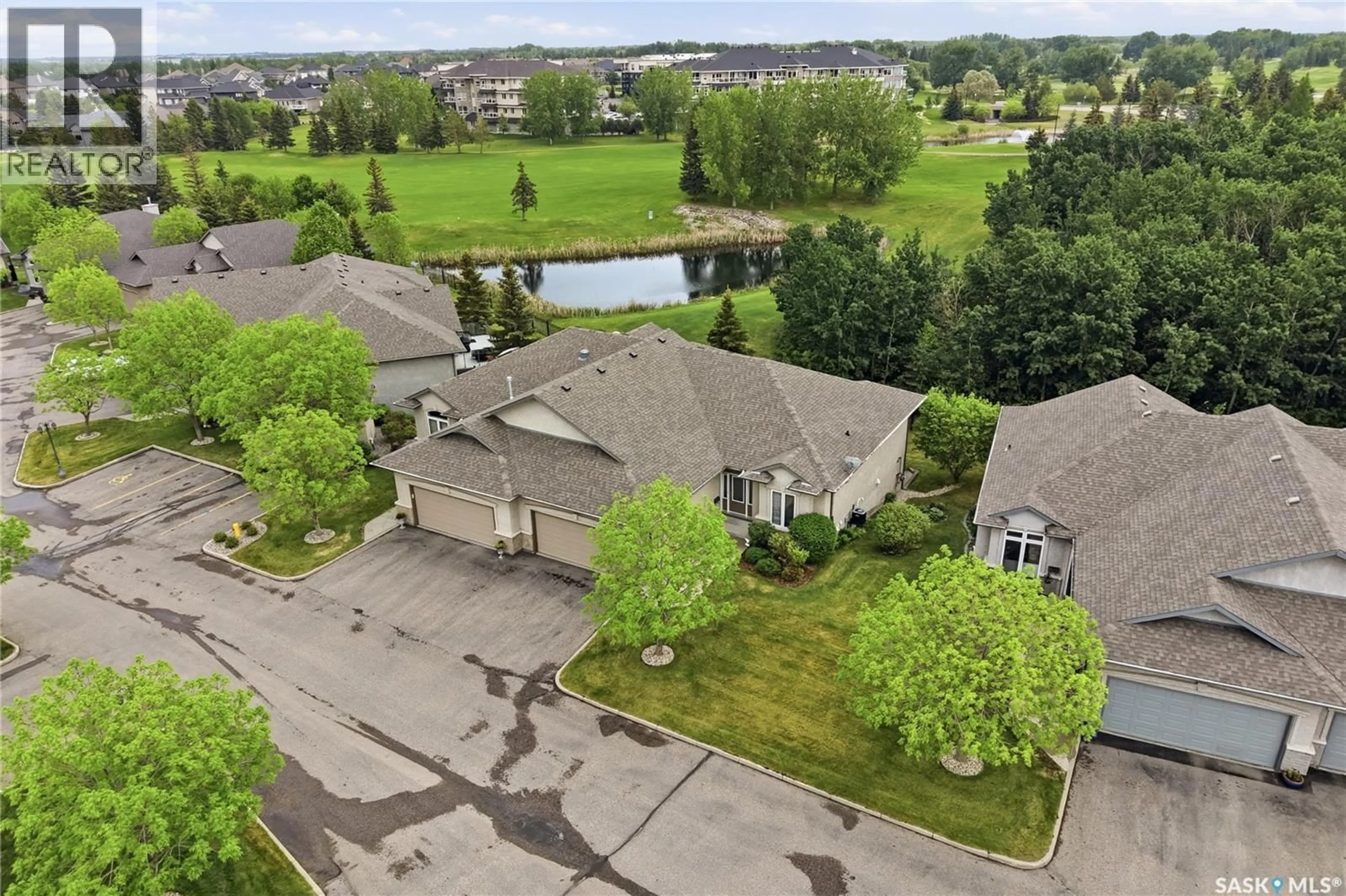 A pic from outside/outdoor area/front of a property/back of a property/a pic from drone, water/lake/river/ocean view for 11 - 301 CARTWRIGHT TERRACE, Saskatoon Saskatchewan S7T1E2