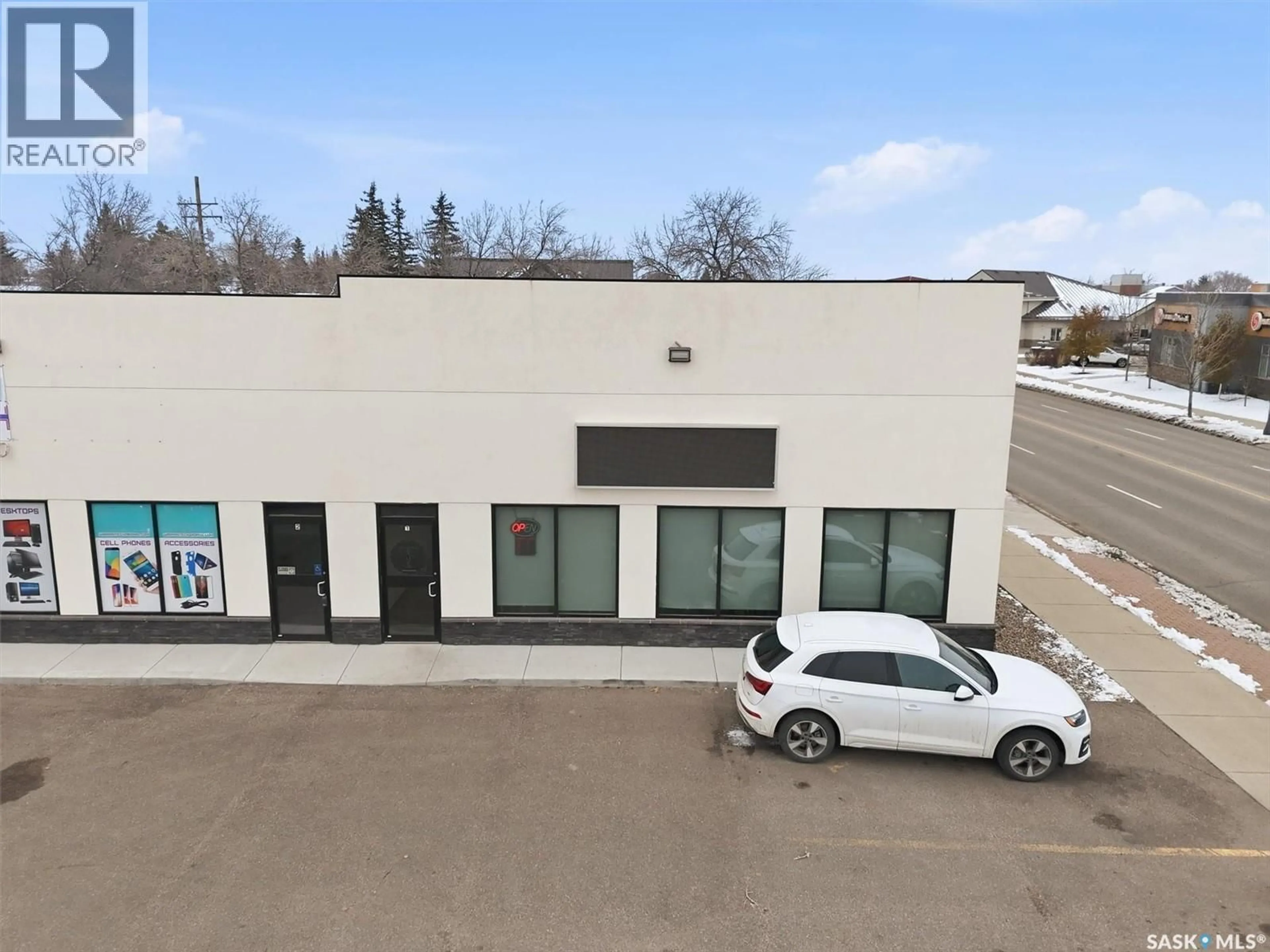 A pic from outside/outdoor area/front of a property/back of a property/a pic from drone, building for 4 212 CENTRAL STREET W, Warman Saskatchewan S0K0A1