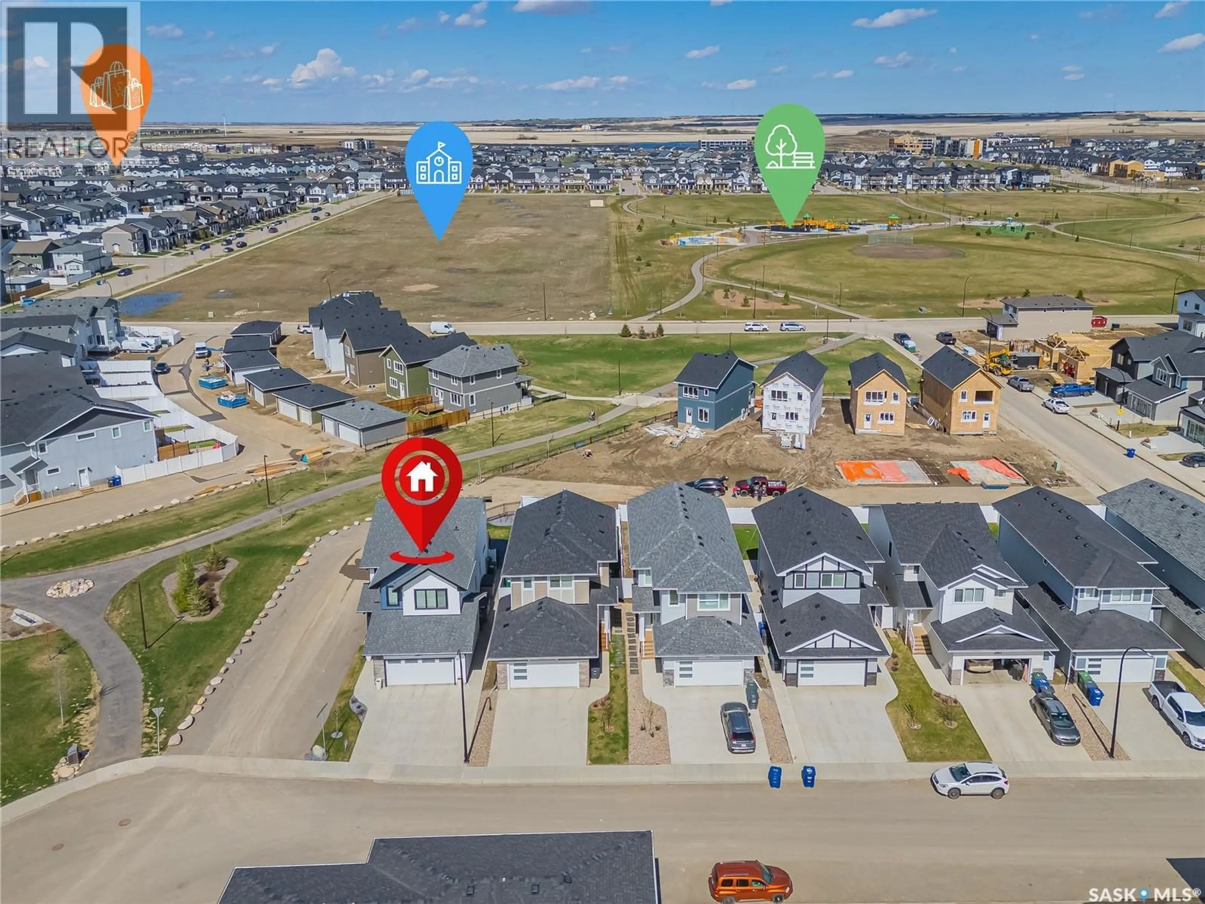A pic from outside/outdoor area/front of a property/back of a property/a pic from drone, street for 351 ANISKOTAW BEND, Saskatoon Saskatchewan S7V1M1