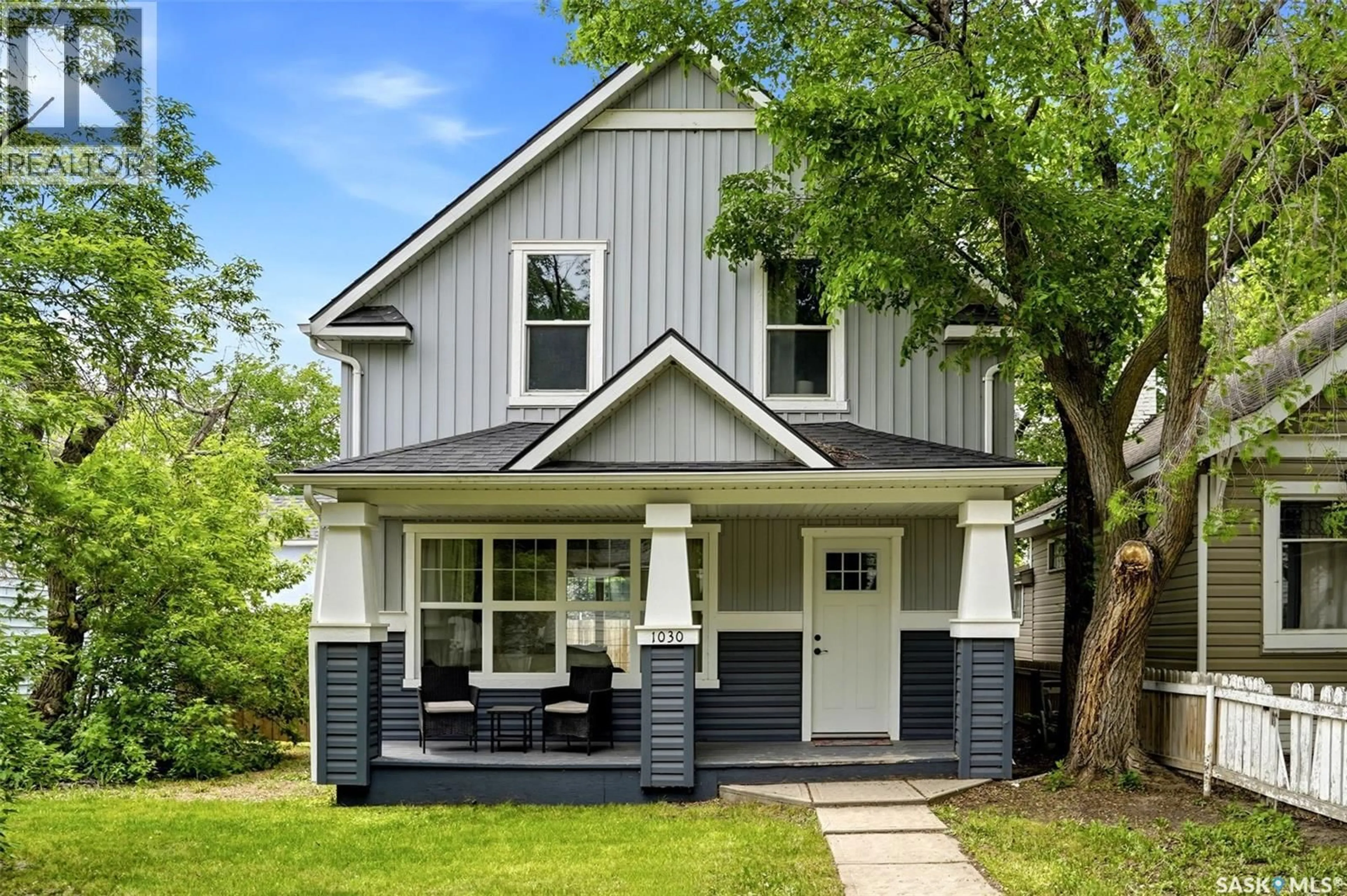 Home with vinyl exterior material, street for 1030 CONNAUGHT AVENUE, Moose Jaw Saskatchewan S6H4B5