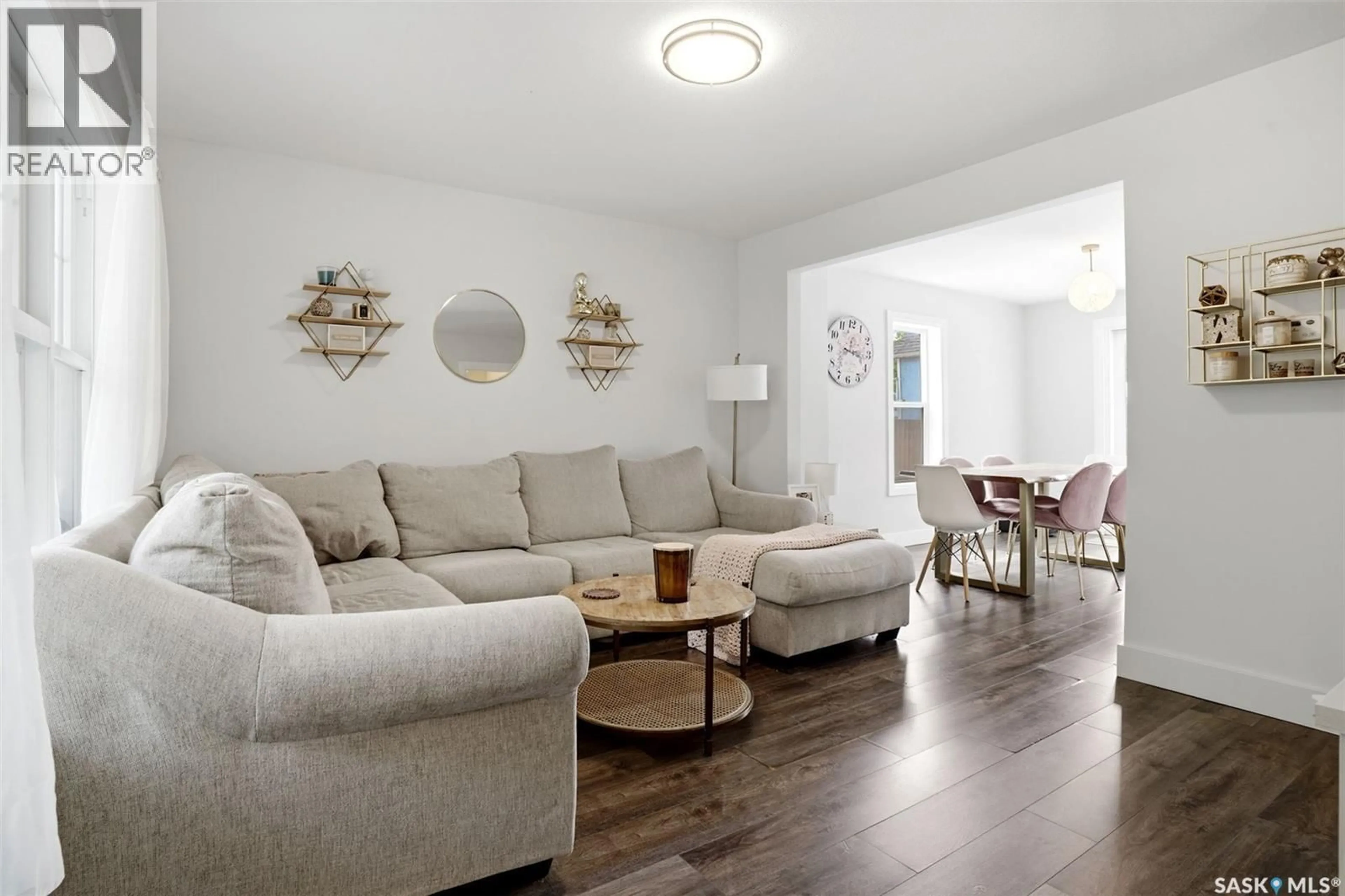 Living room with furniture, wood/laminate floor for 1030 CONNAUGHT AVENUE, Moose Jaw Saskatchewan S6H4B5