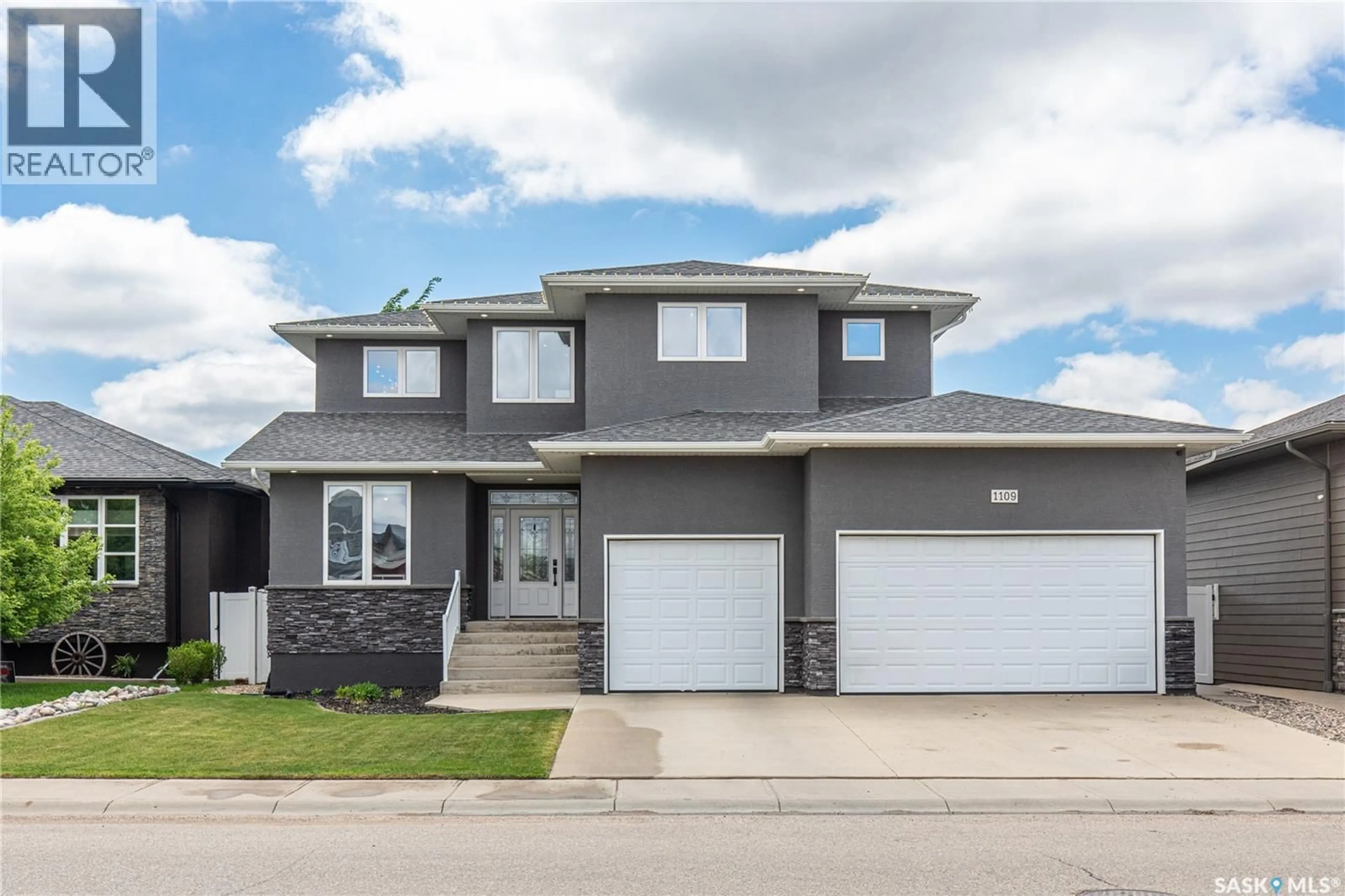 Home with vinyl exterior material, street for 1109 MEIER DRIVE, Moose Jaw Saskatchewan S6J0B2