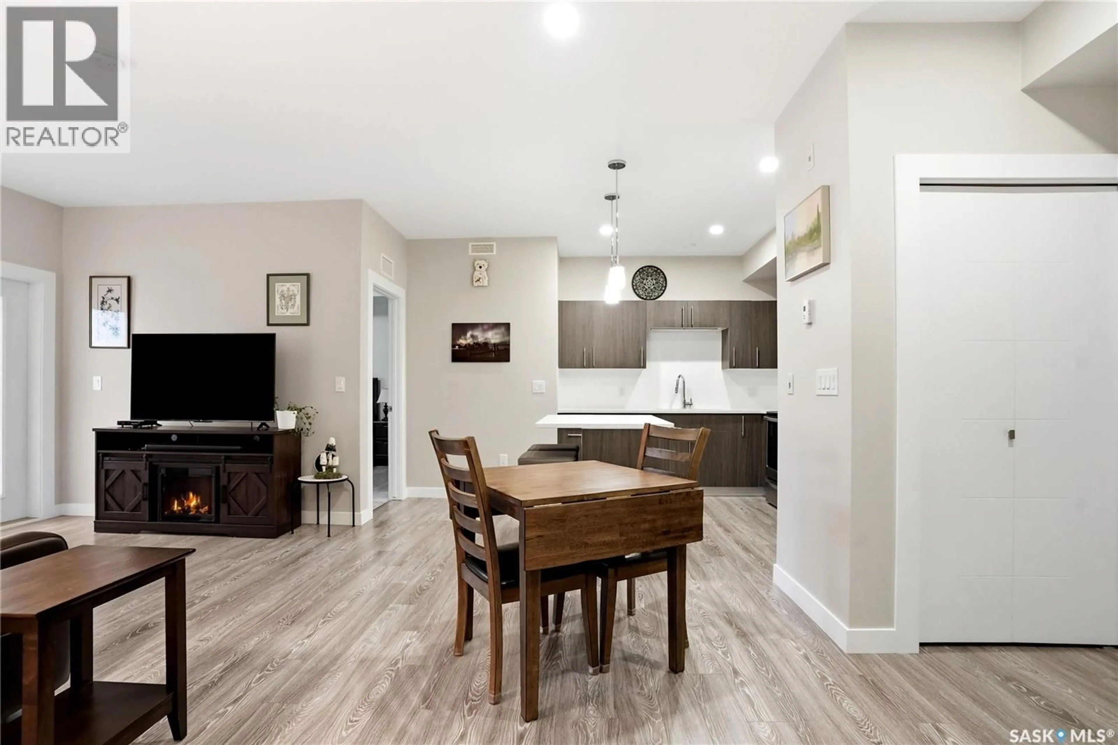 Open concept kitchen, wood/laminate floor for 142 - 307 PAWLYCHENKO LANE, Saskatoon Saskatchewan S7V0N7