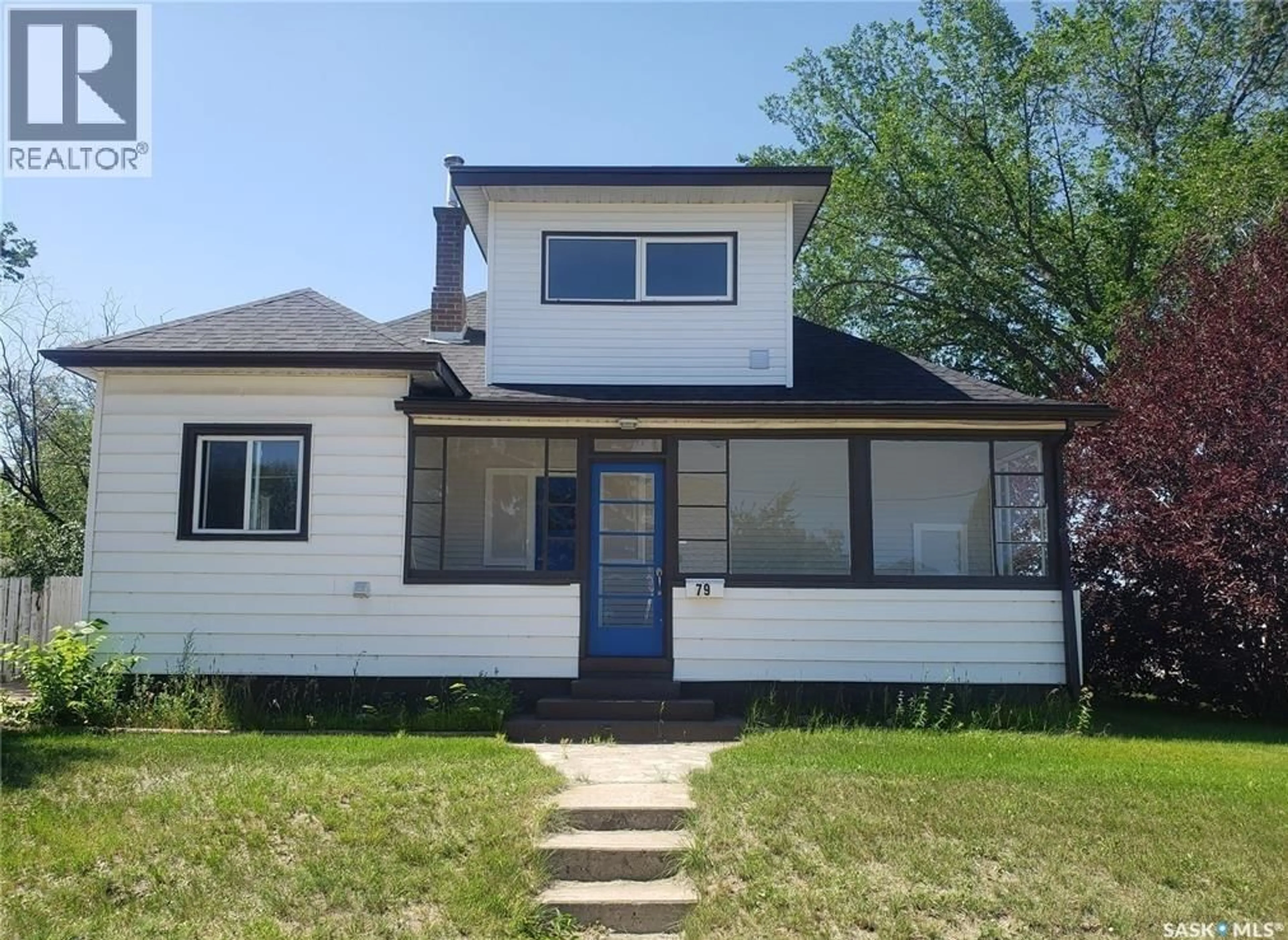 Home with vinyl exterior material, street for 79 COTEAU STREET E, Moose Jaw Saskatchewan S6H4T4