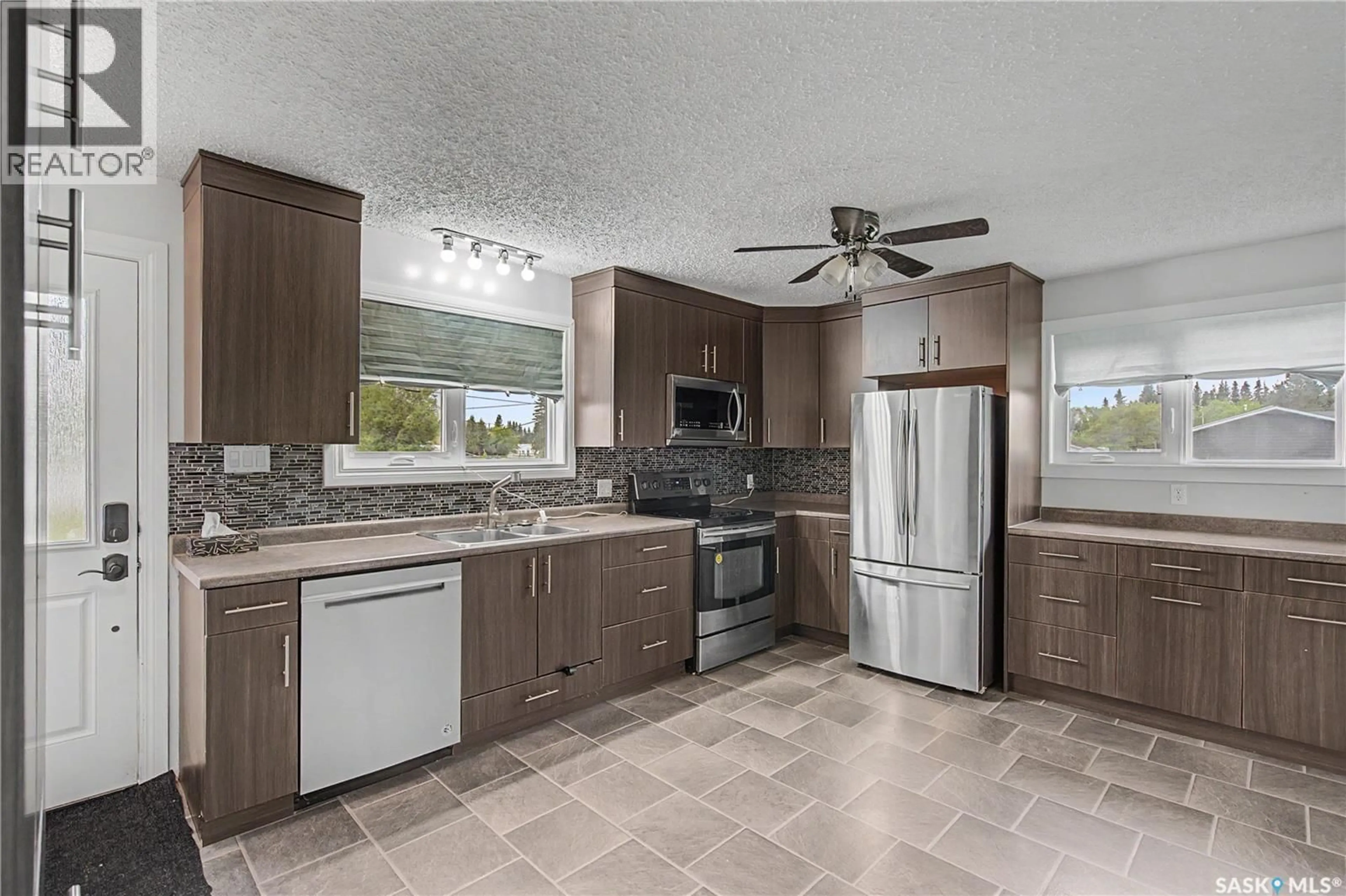 Open concept kitchen, ceramic/tile floor for 142 2ND STREET, Pierceland Saskatchewan S0M2K0