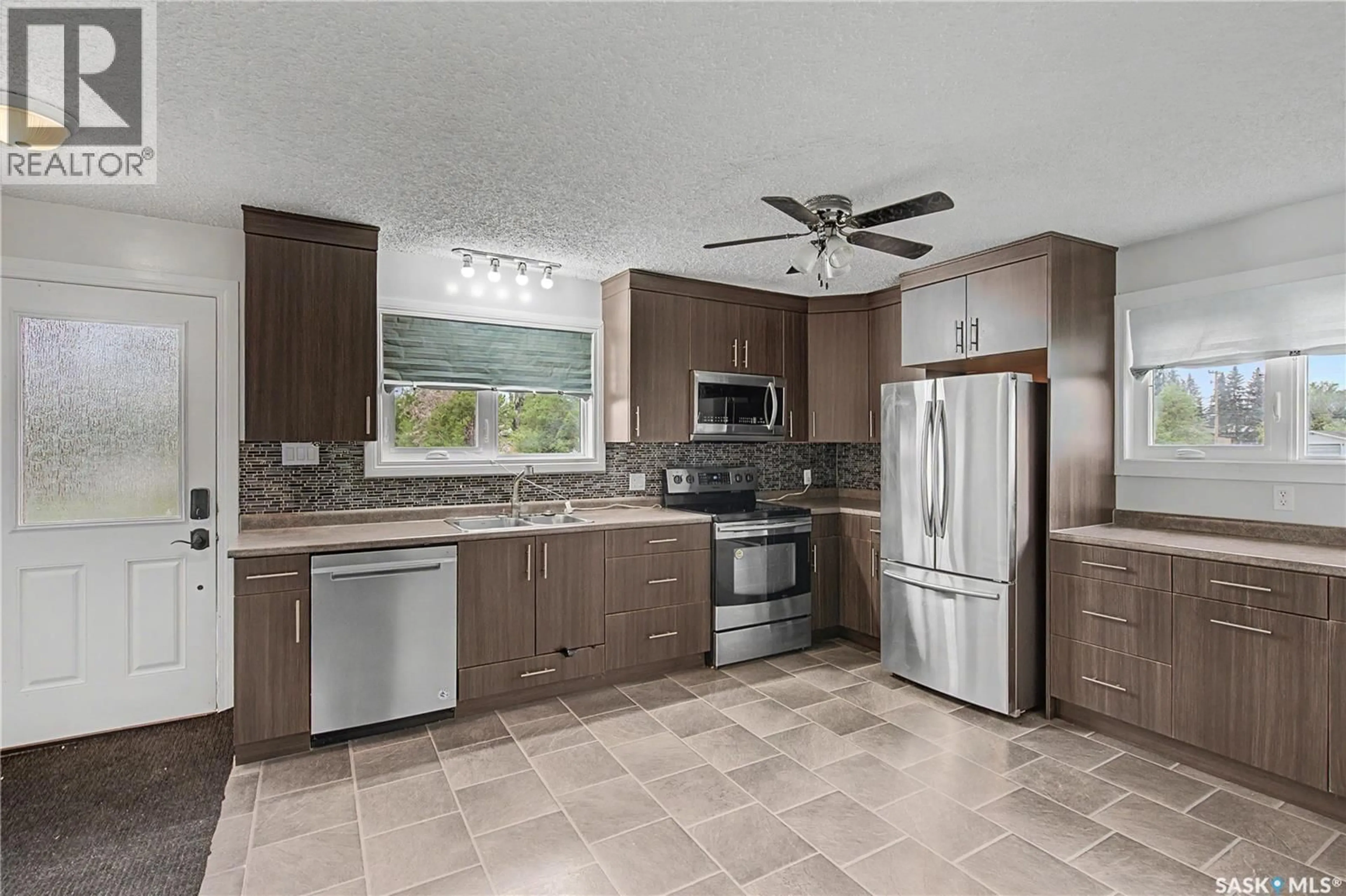 Open concept kitchen, ceramic/tile floor for 142 2ND STREET, Pierceland Saskatchewan S0M2K0