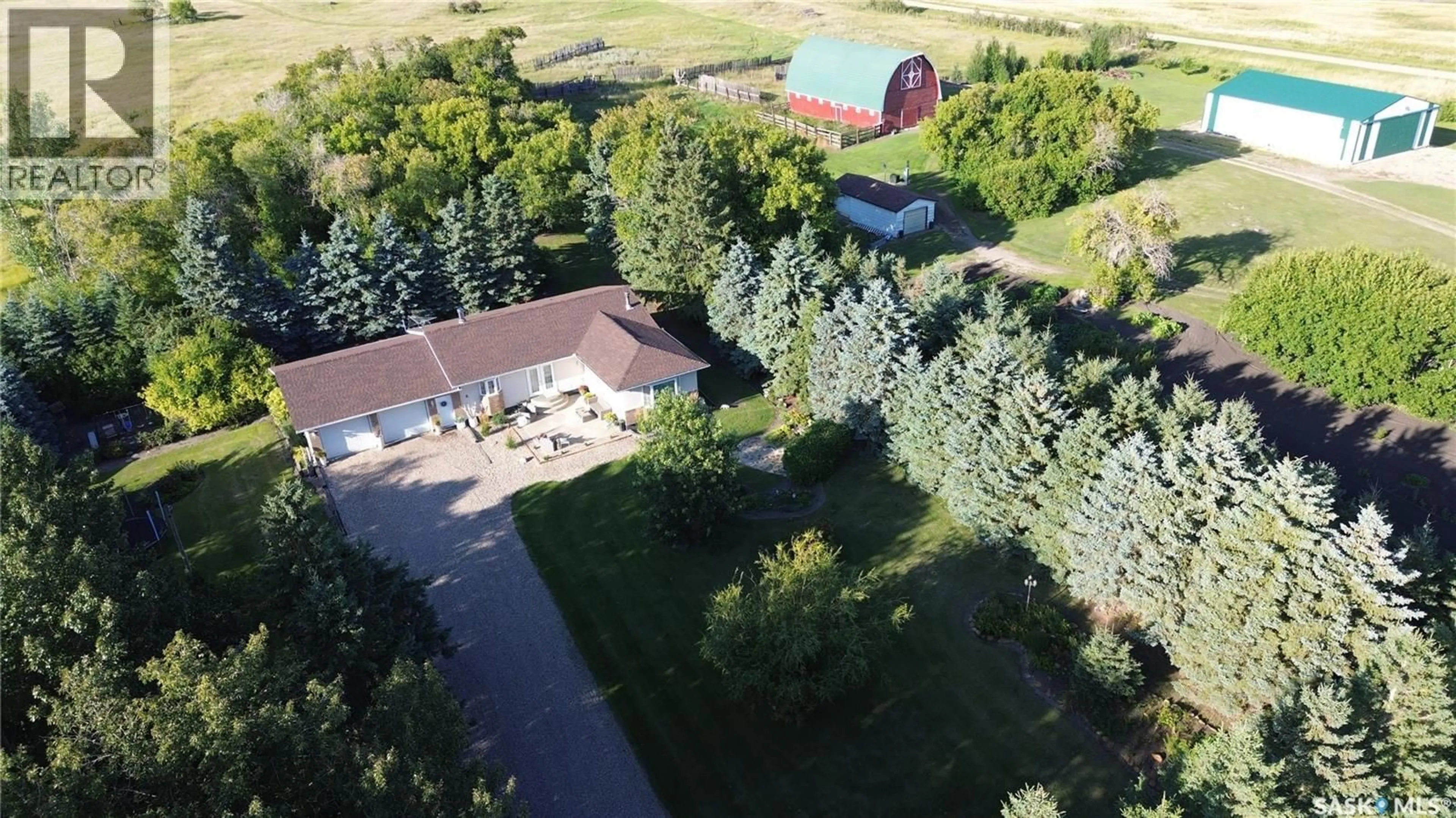 A pic from outside/outdoor area/front of a property/back of a property/a pic from drone, mountain view for Acreage - JOURNEY ACRES, Langenburg Rm No. 181 Saskatchewan S0A0M0