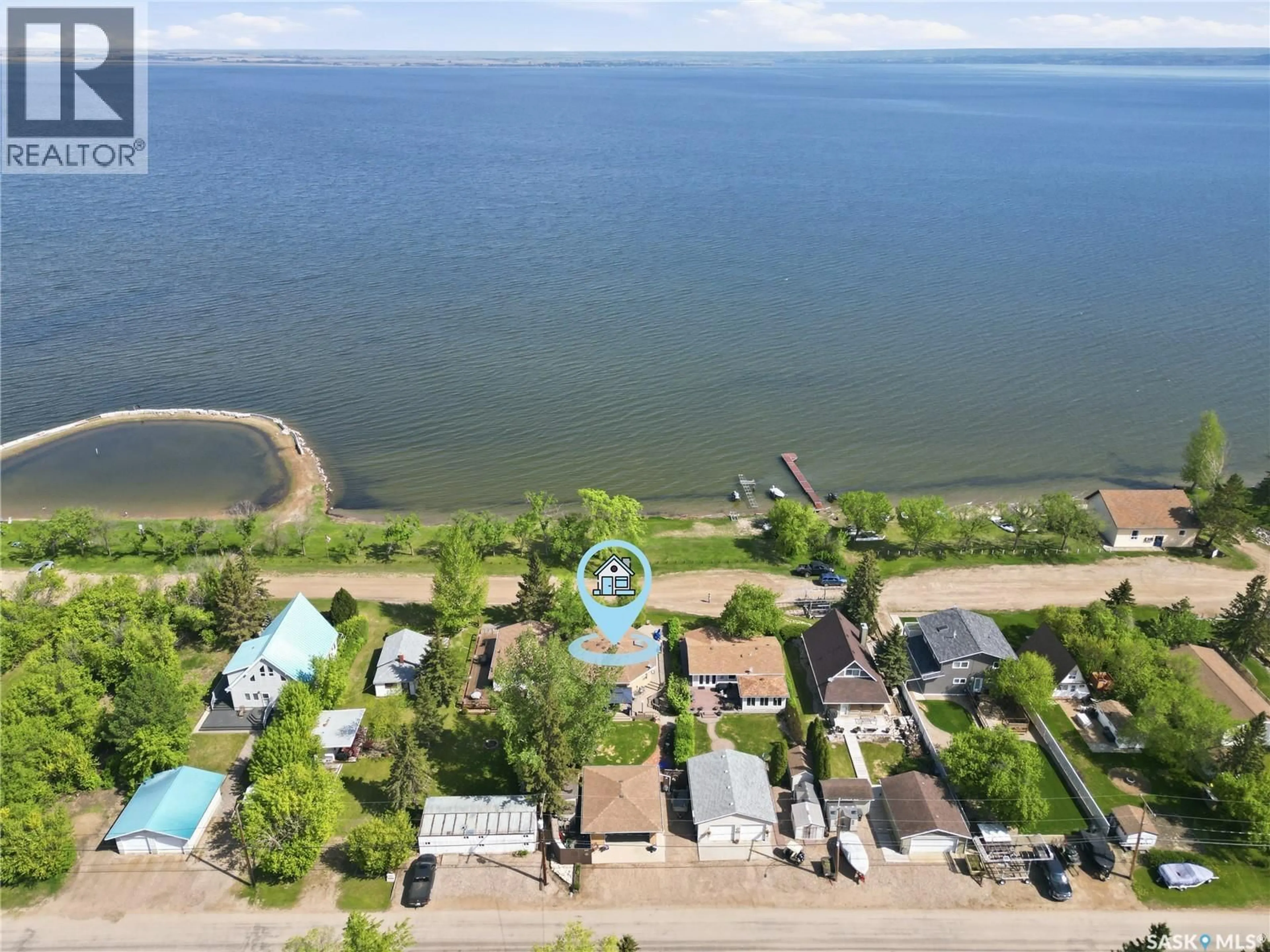 A pic from outside/outdoor area/front of a property/back of a property/a pic from drone, water/lake/river/ocean view for 640 BEACH AVENUE, Meota Saskatchewan S0M1X0