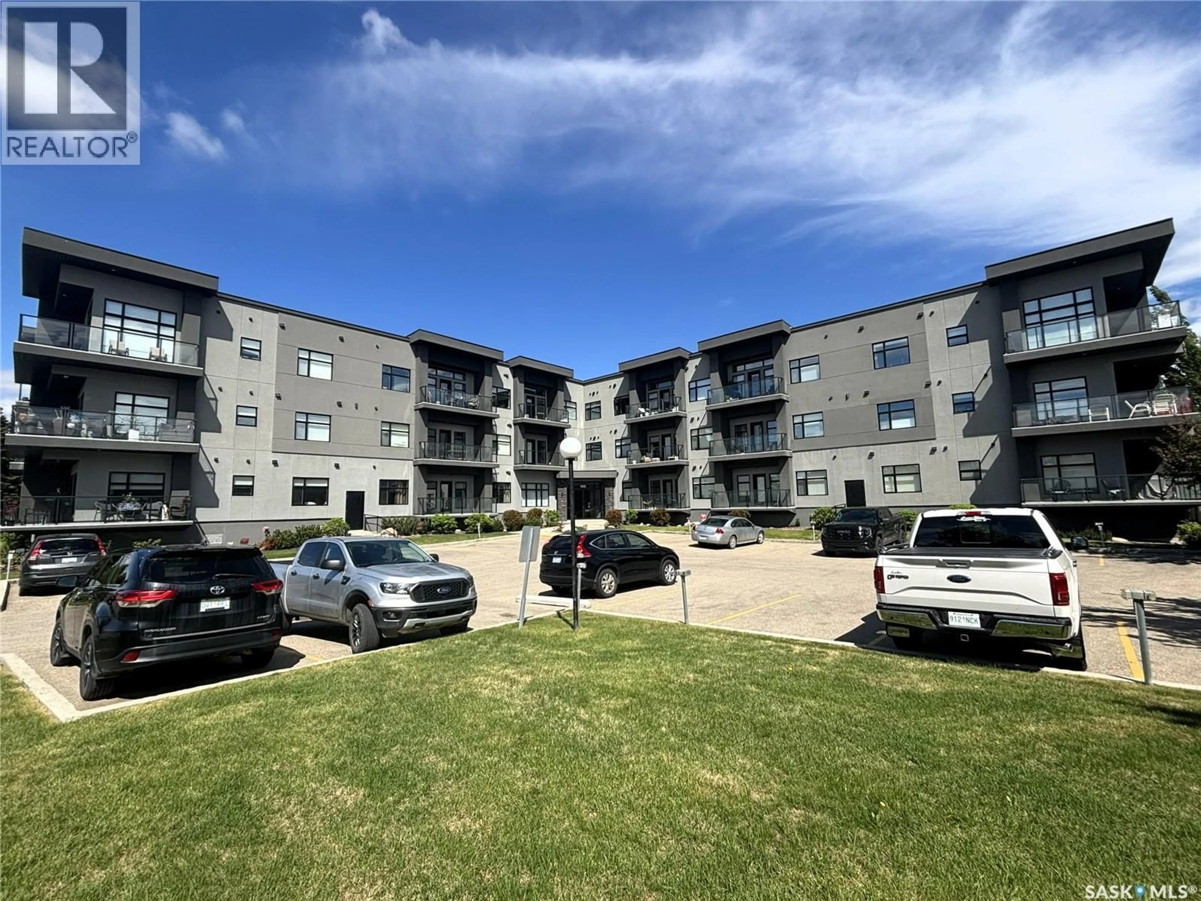 A pic from outside/outdoor area/front of a property/back of a property/a pic from drone, building for 502 - 216-502 PEREHUDOFF CRESCENT, Saskatoon Saskatchewan S7N4H6