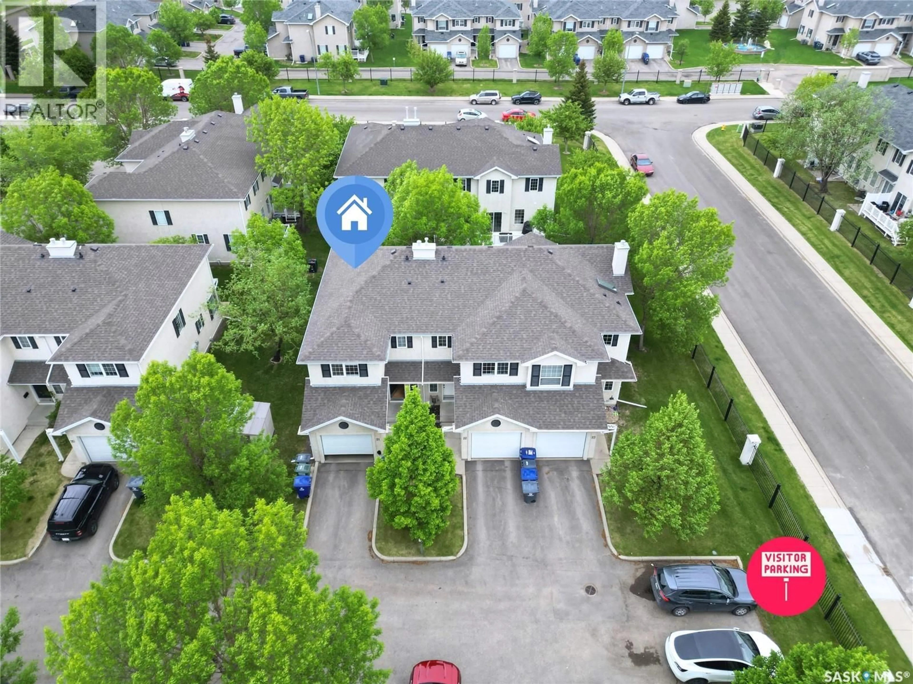 A pic from outside/outdoor area/front of a property/back of a property/a pic from drone, street for 21 138 BANYAN CRESCENT, Saskatoon Saskatchewan S7V1G8