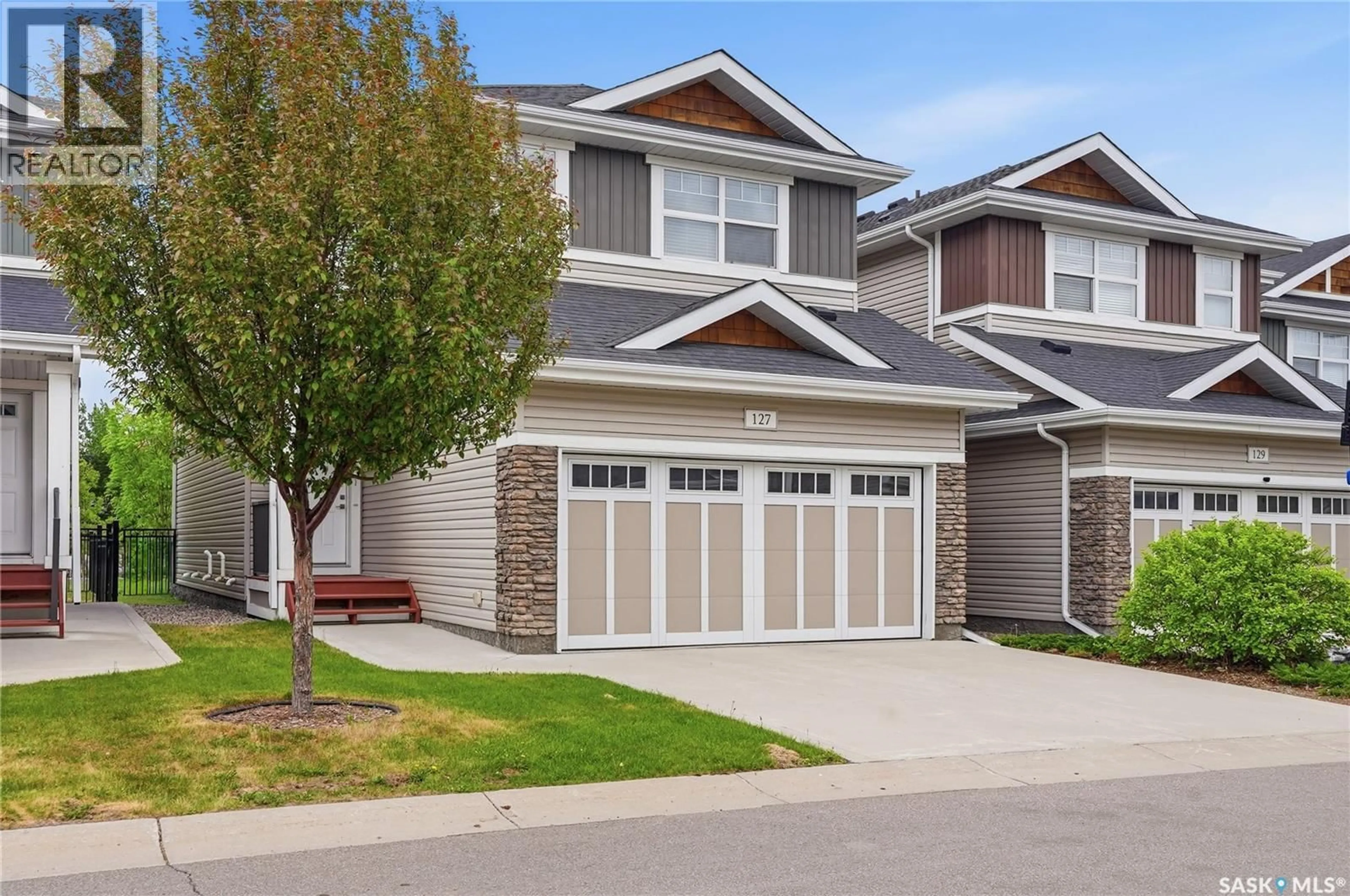 Home with vinyl exterior material, street for 315 - 127 DICKSON CRESCENT, Saskatoon Saskatchewan S7T0Z1