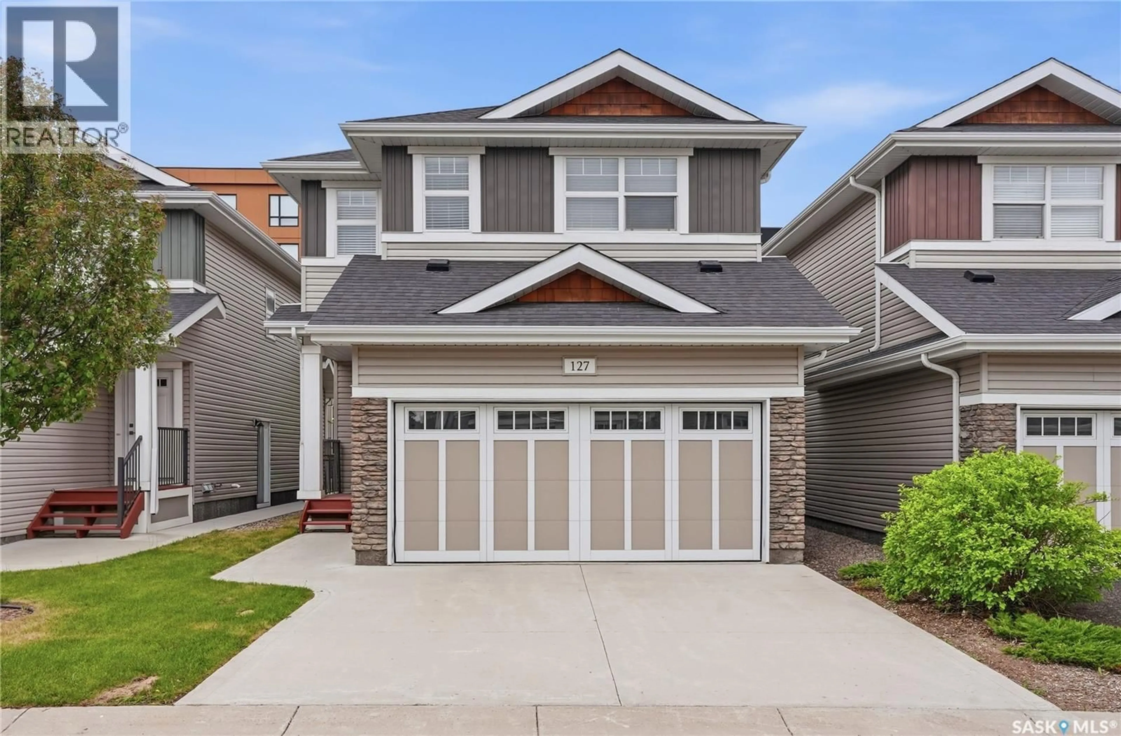 Home with vinyl exterior material, street for 315 - 127 DICKSON CRESCENT, Saskatoon Saskatchewan S7T0Z1