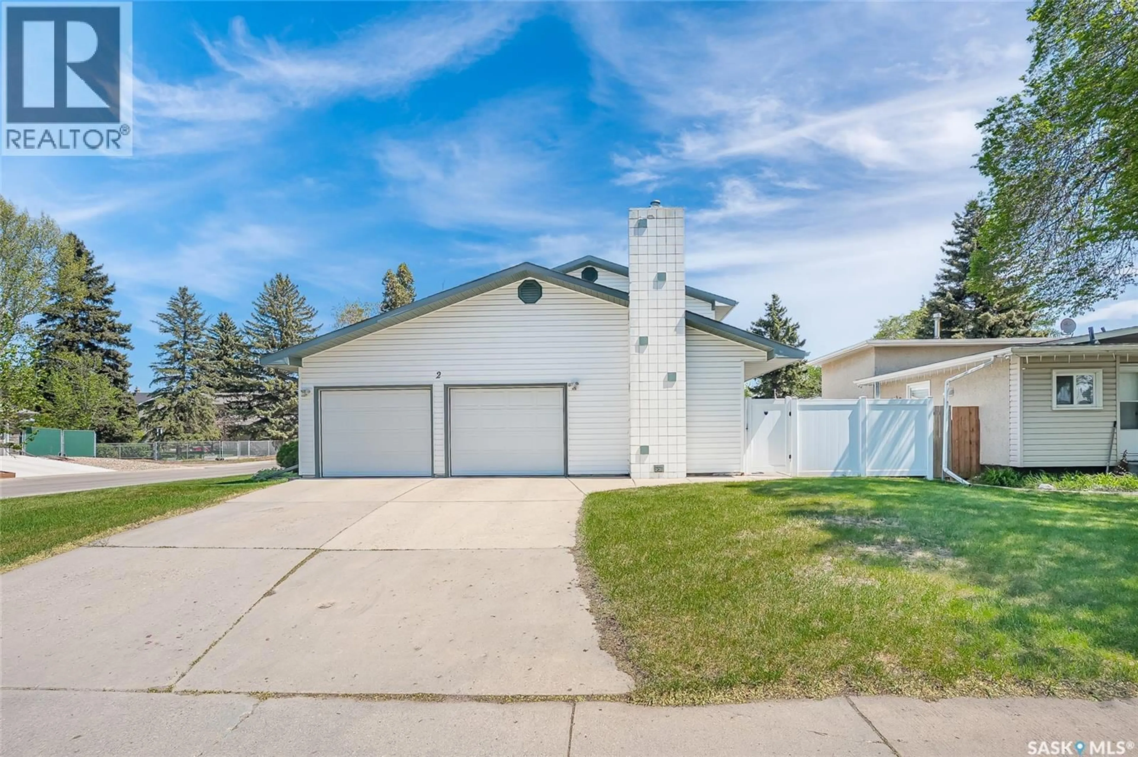 Home with vinyl exterior material, street for 2 CAMBRIDGE CRESCENT, Saskatoon Saskatchewan S7H3P8