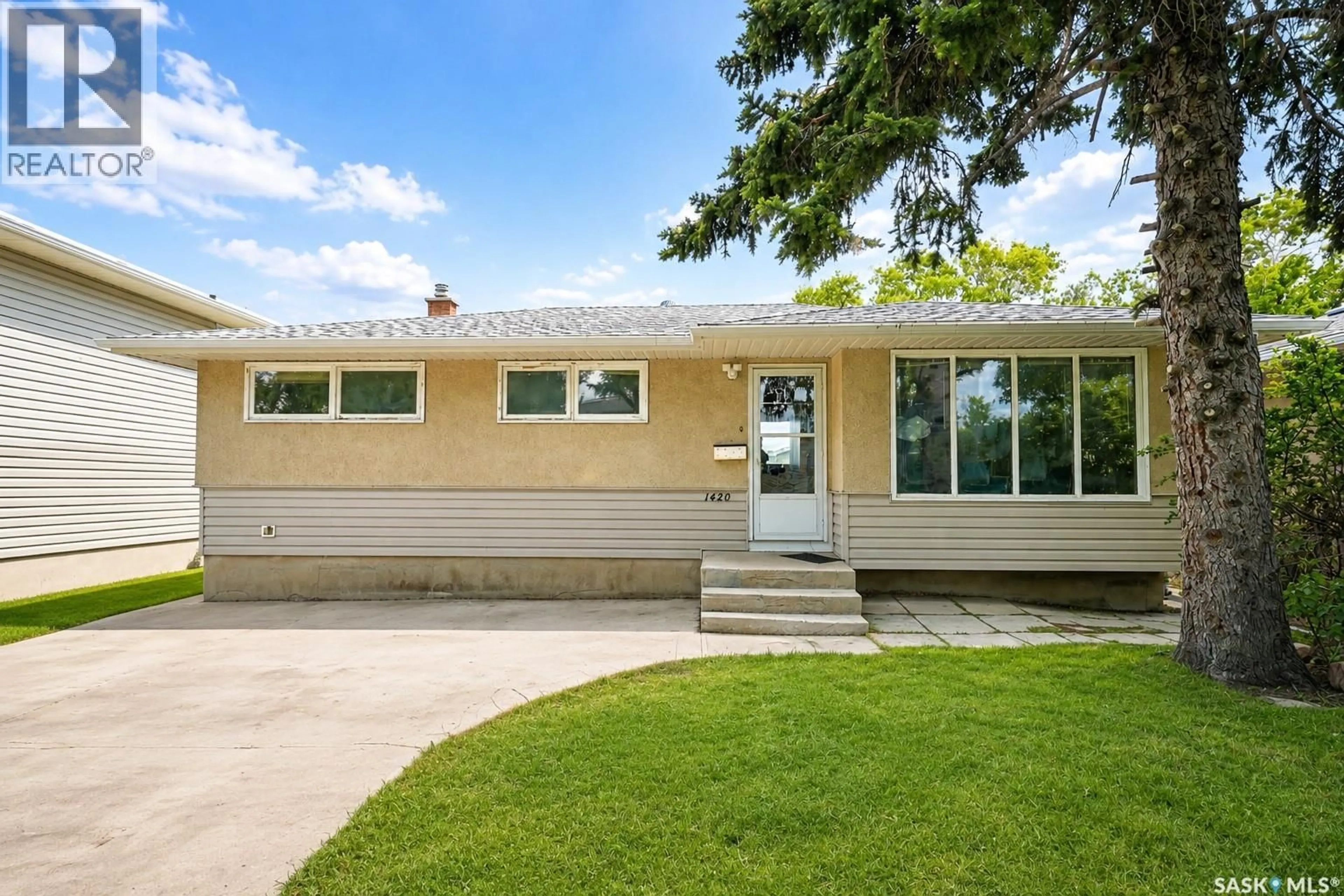 Home with vinyl exterior material, street for 1420 GROSVENOR STREET, Regina Saskatchewan S4N1R3
