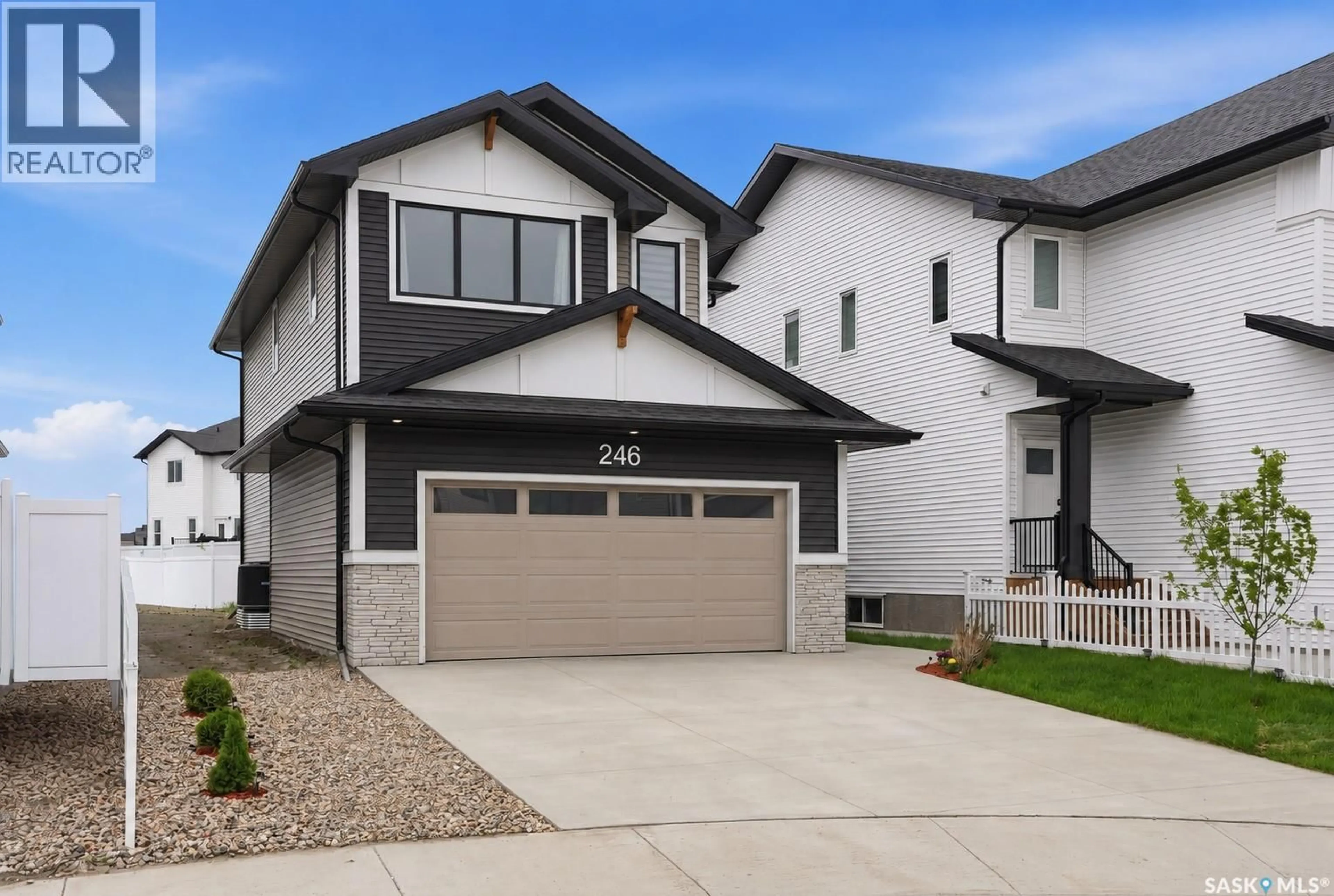 Home with vinyl exterior material, street for 246 KATZ COURT, Saskatoon Saskatchewan S7H4R1