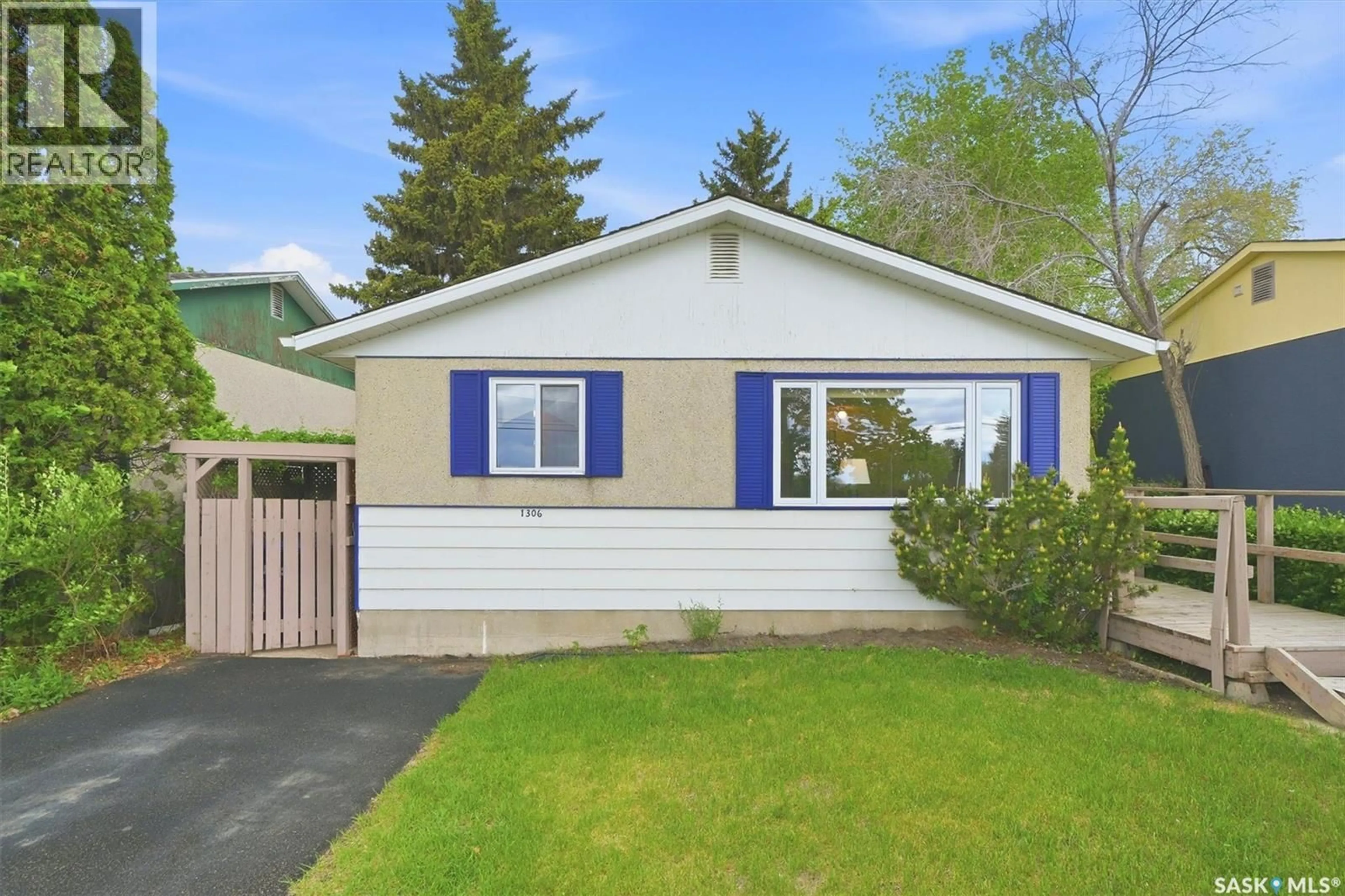 Home with vinyl exterior material, street for 1306 EGBERT AVENUE, Saskatoon Saskatchewan S7N1X7