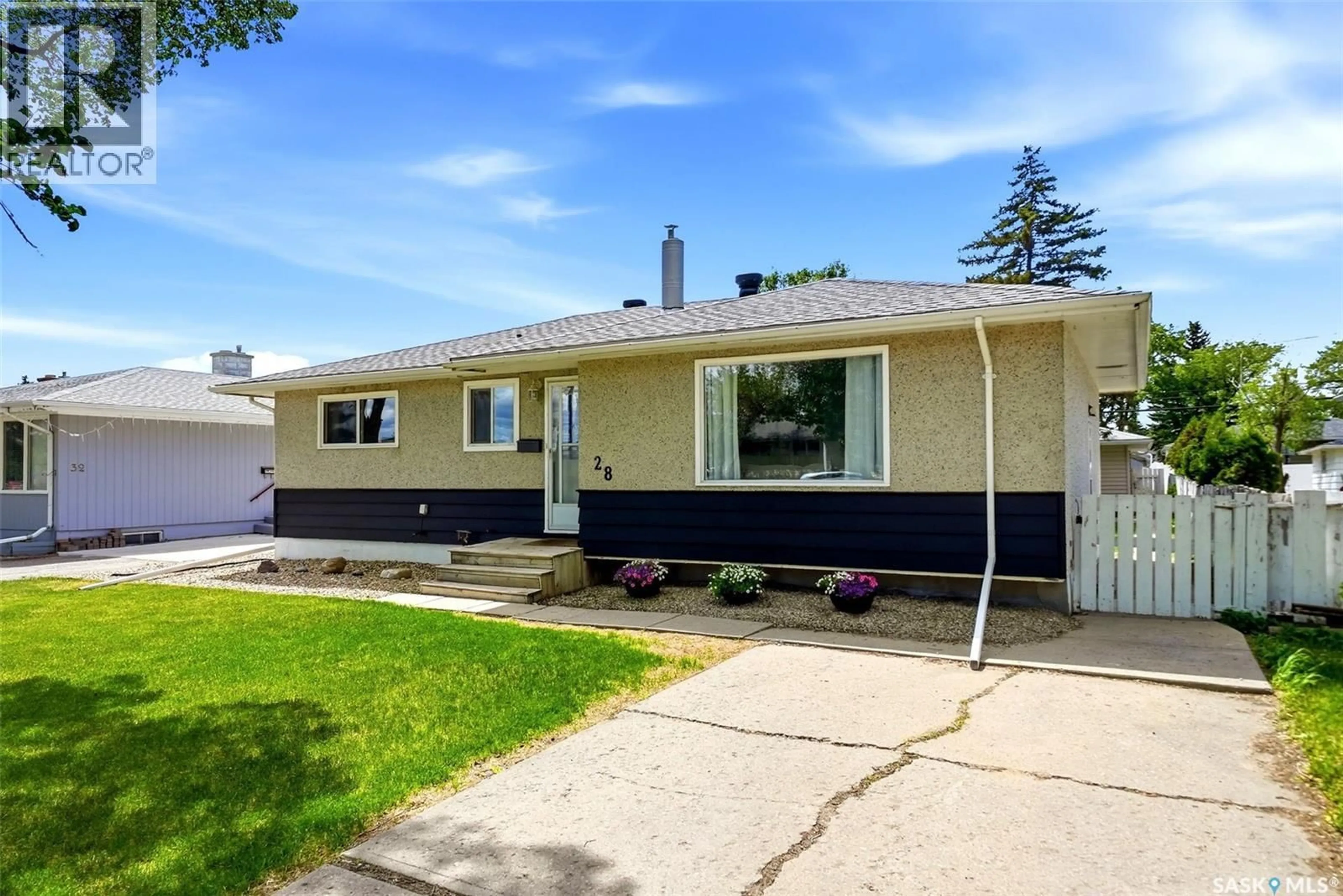 Home with vinyl exterior material, street for 28 CAMERON CRESCENT, Regina Saskatchewan S4S2X2