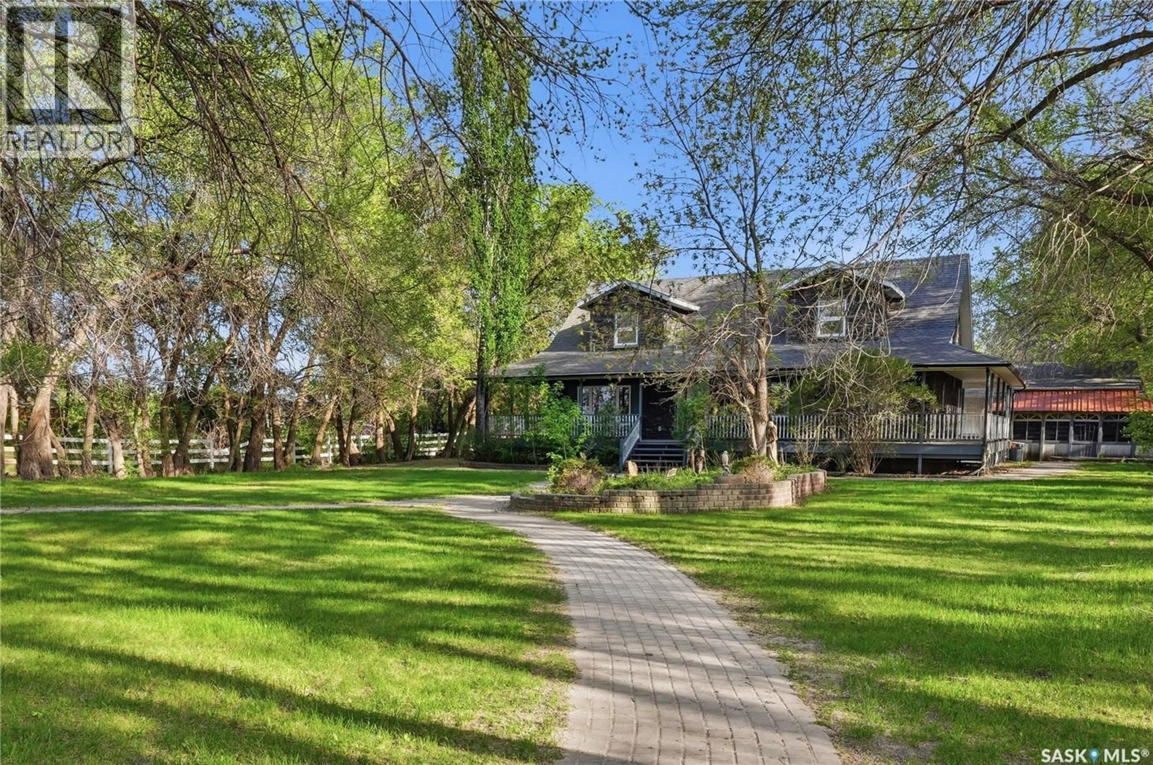 A pic from outside/outdoor area/front of a property/back of a property/a pic from drone, street for ELLIOT ACREAGE, Dundurn Rm No. 314 Saskatchewan S7C0E2