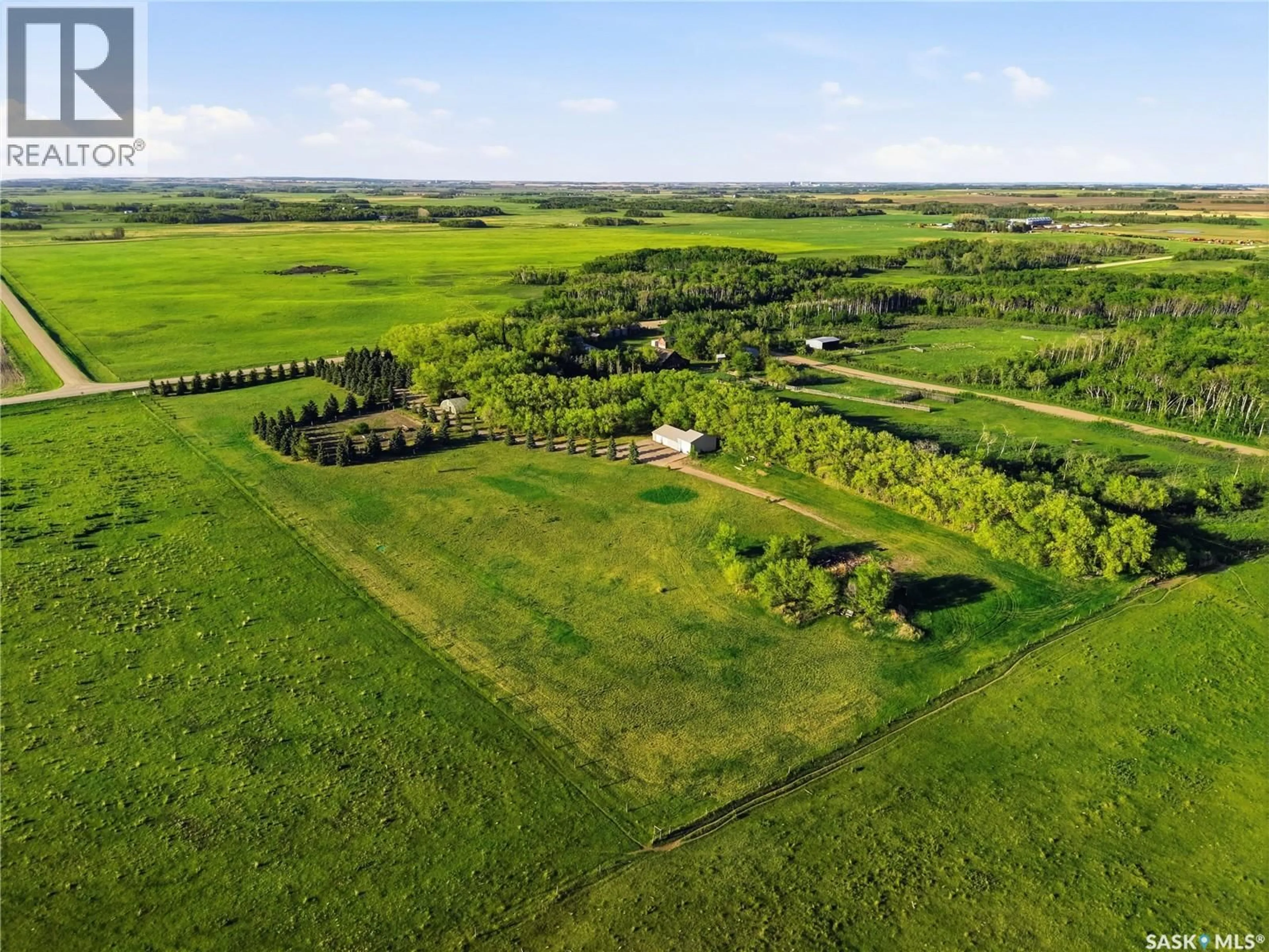 A pic from outside/outdoor area/front of a property/back of a property/a pic from drone, forest/trees view for ELLIOT ACREAGE, Dundurn Rm No. 314 Saskatchewan S7C0E2