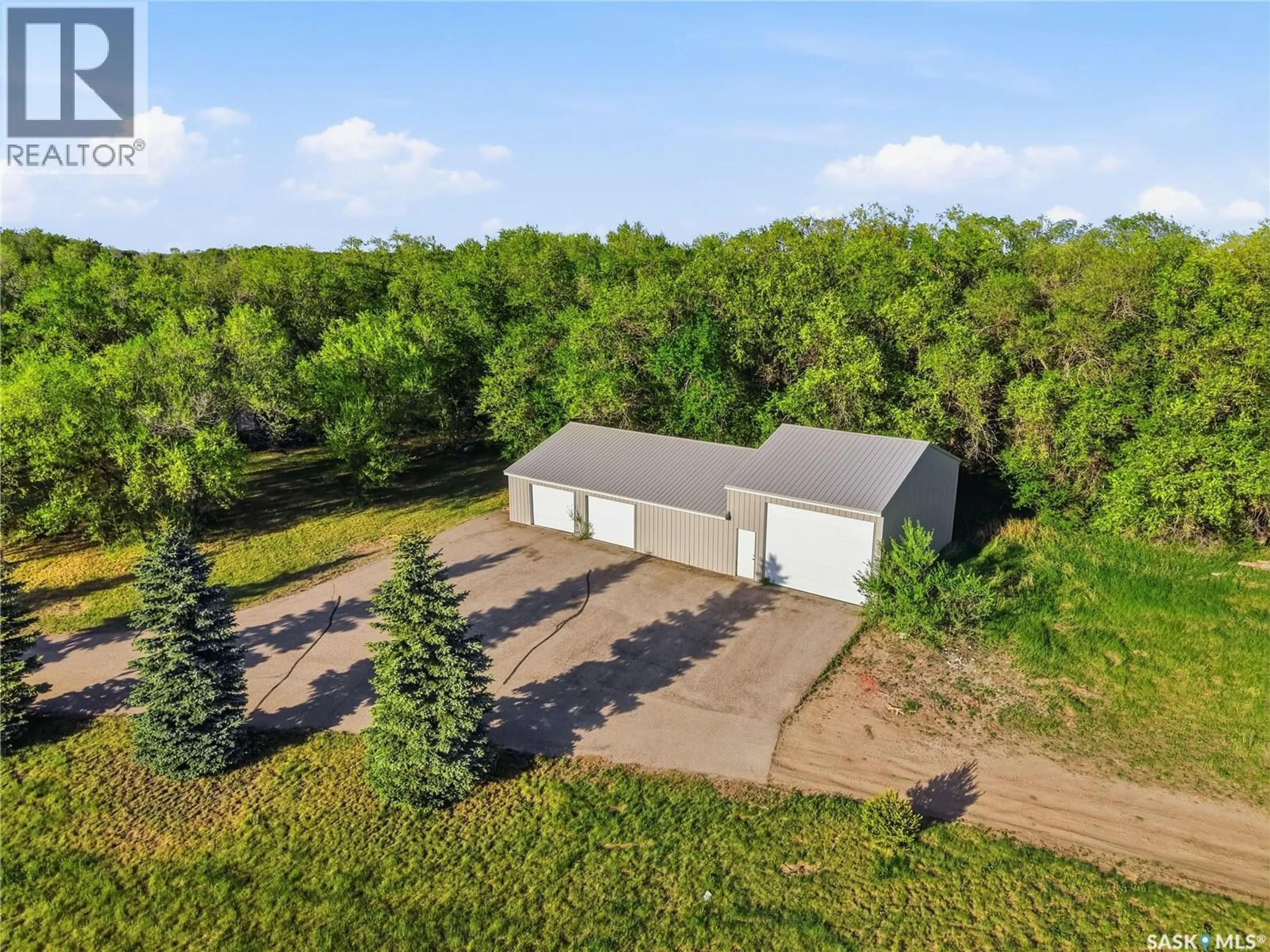 A pic from outside/outdoor area/front of a property/back of a property/a pic from drone, building for ELLIOT ACREAGE, Dundurn Rm No. 314 Saskatchewan S7C0E2