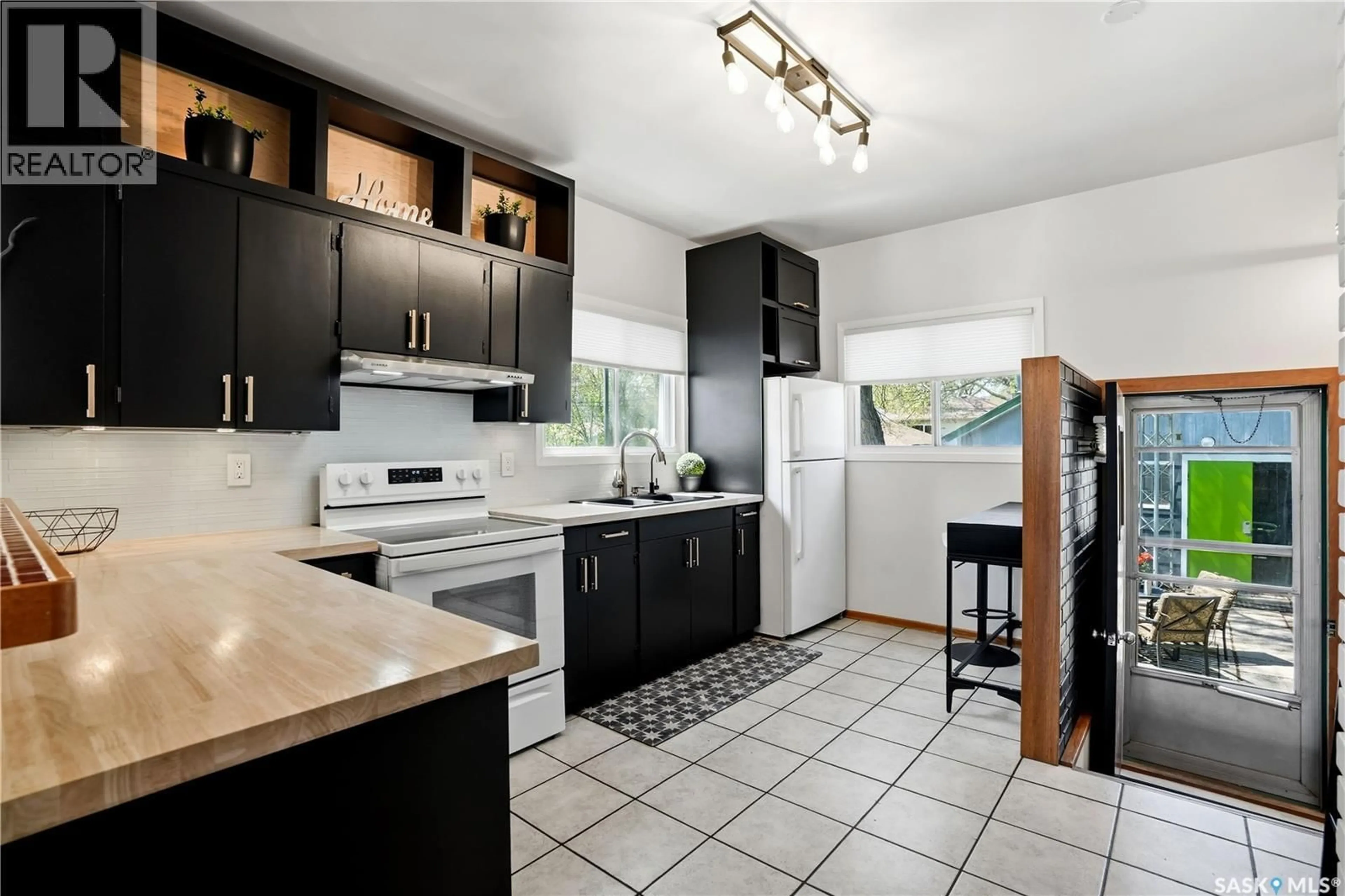Open concept kitchen, ceramic/tile floor for 3136 ROBINSON STREET, Regina Saskatchewan S4S1V5