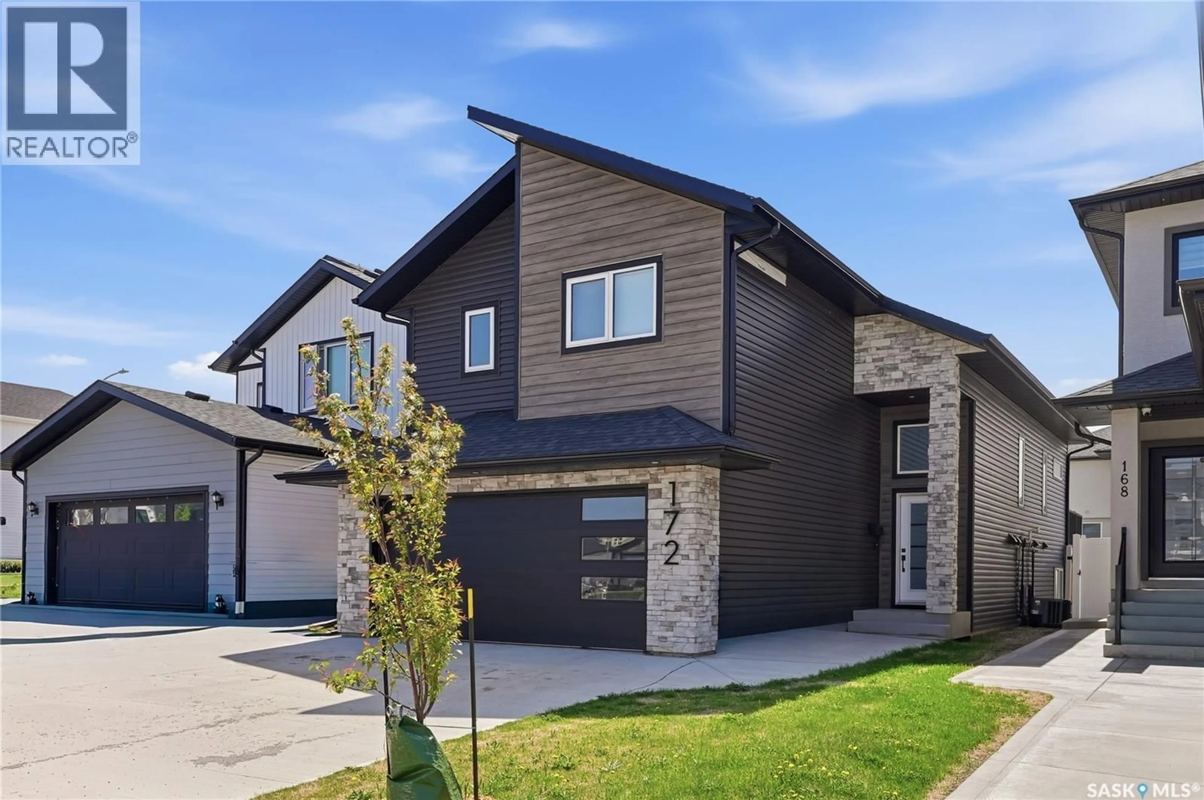 Home with brick exterior material, street for 172 THAKUR STREET, Saskatoon Saskatchewan S7W1C4