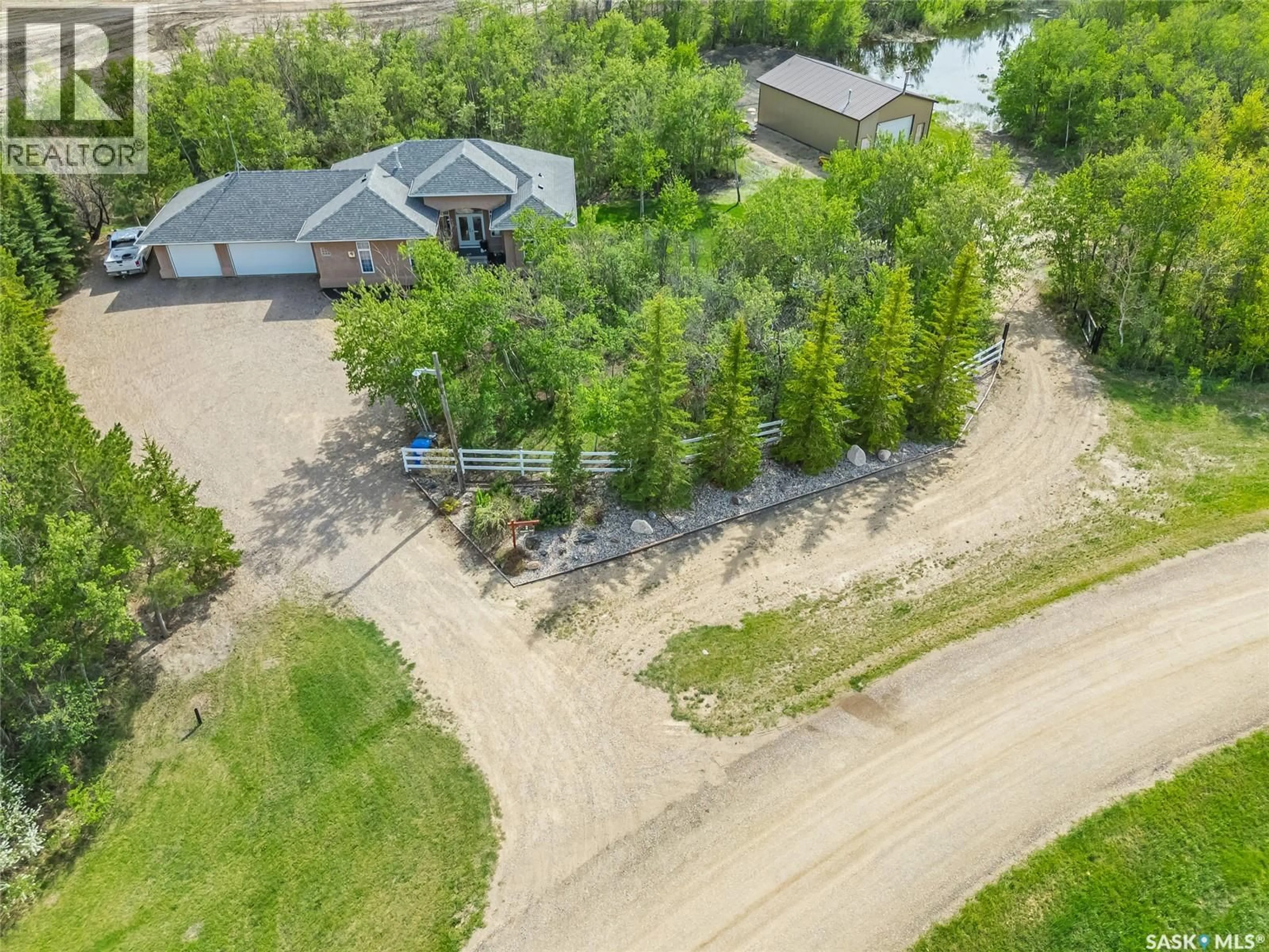 A pic from outside/outdoor area/front of a property/back of a property/a pic from drone, unknown for 2 DISCOVERY TRAIL, Corman Park Rm No. 344 Saskatchewan S7K3J9