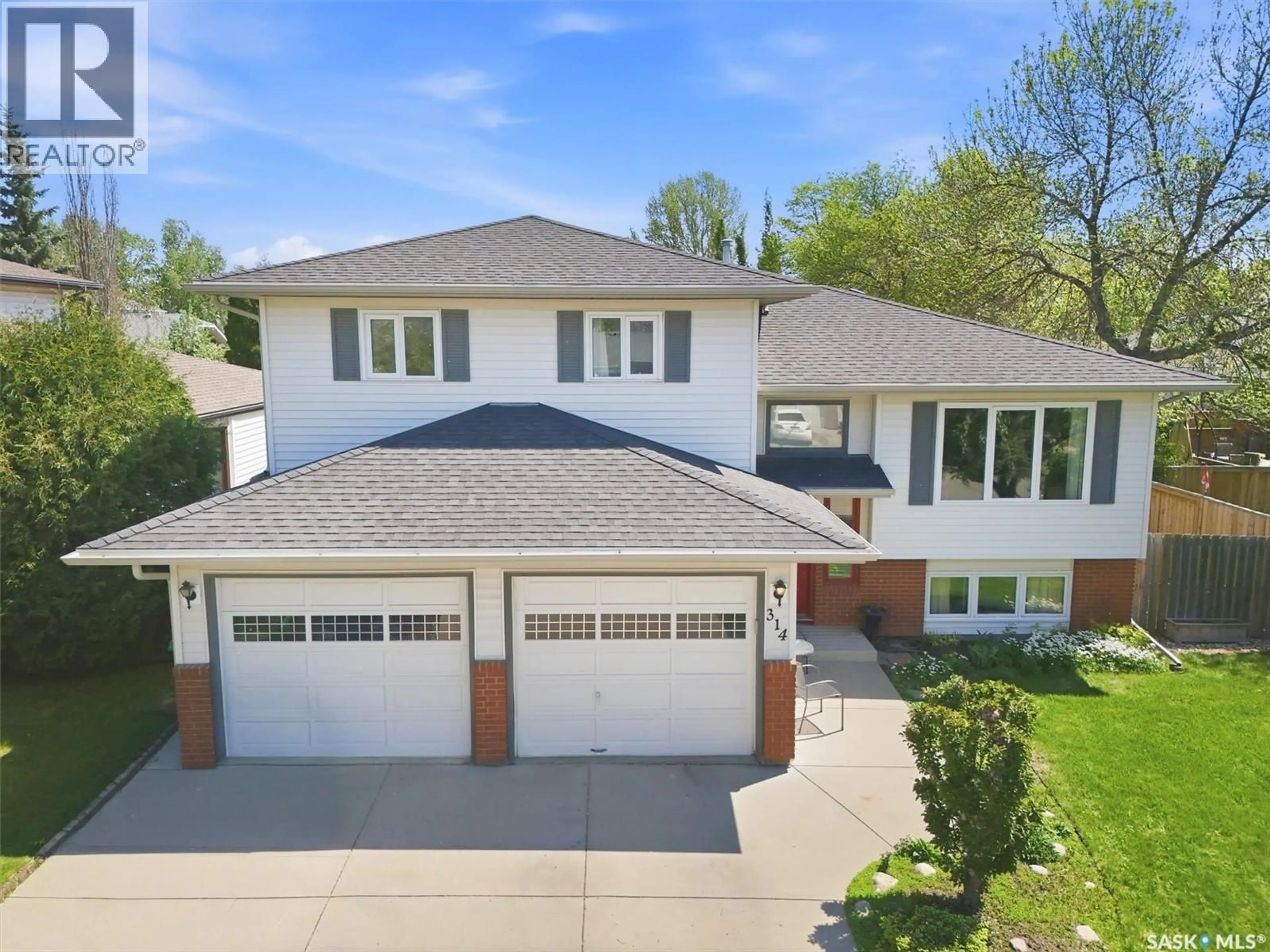 Home with brick exterior material, street for 314 BORNSTEIN CRESCENT, Saskatoon Saskatchewan S7N3Y3