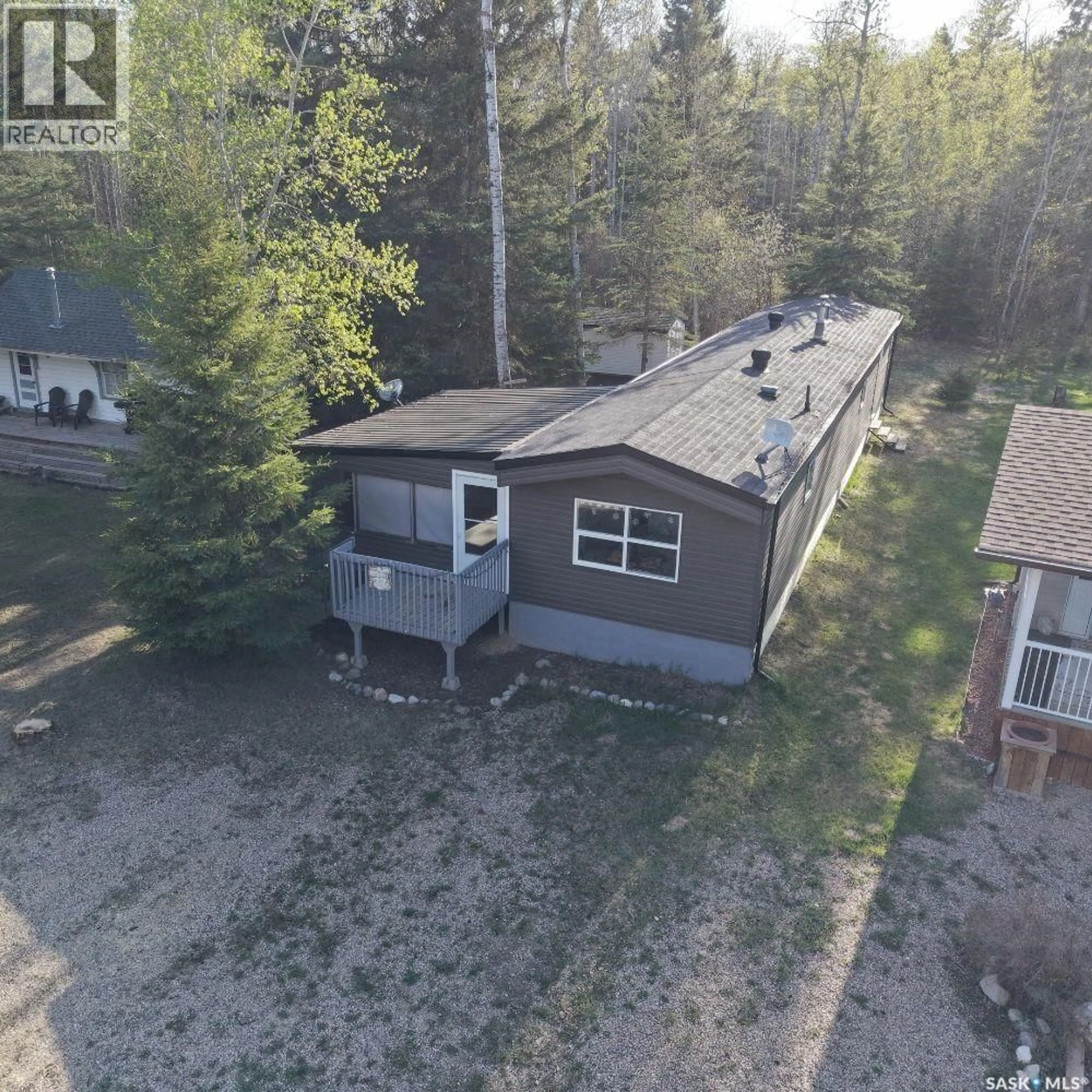 A pic from outside/outdoor area/front of a property/back of a property/a pic from drone, street for A27 - 150 OKEMA BEACH ROAD, Lakeland Rm No. 521 Saskatchewan S0J0N0