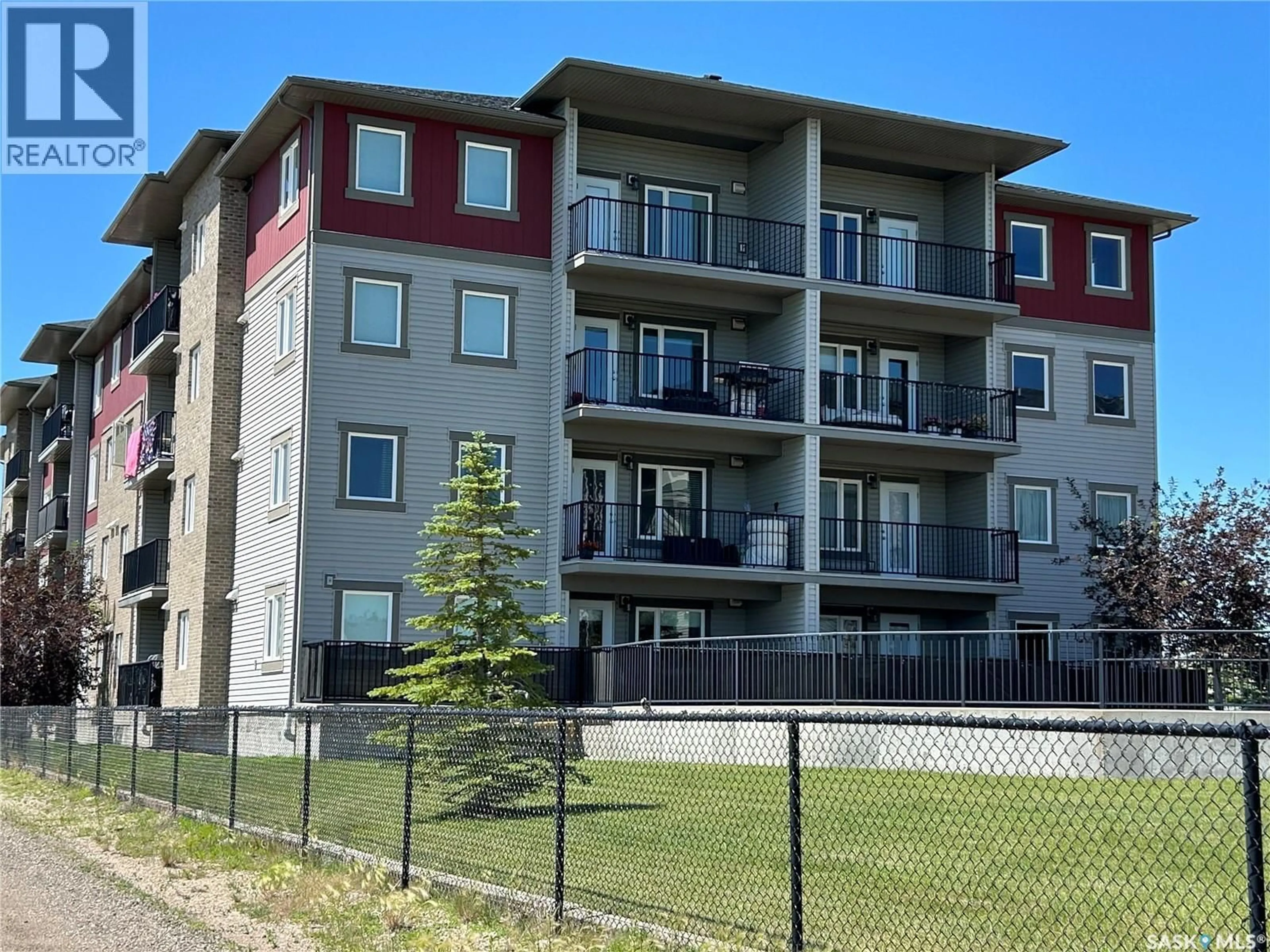 A pic from outside/outdoor area/front of a property/back of a property/a pic from drone, building for 210 308 PETTERSON DRIVE, Estevan Saskatchewan S4A2B8
