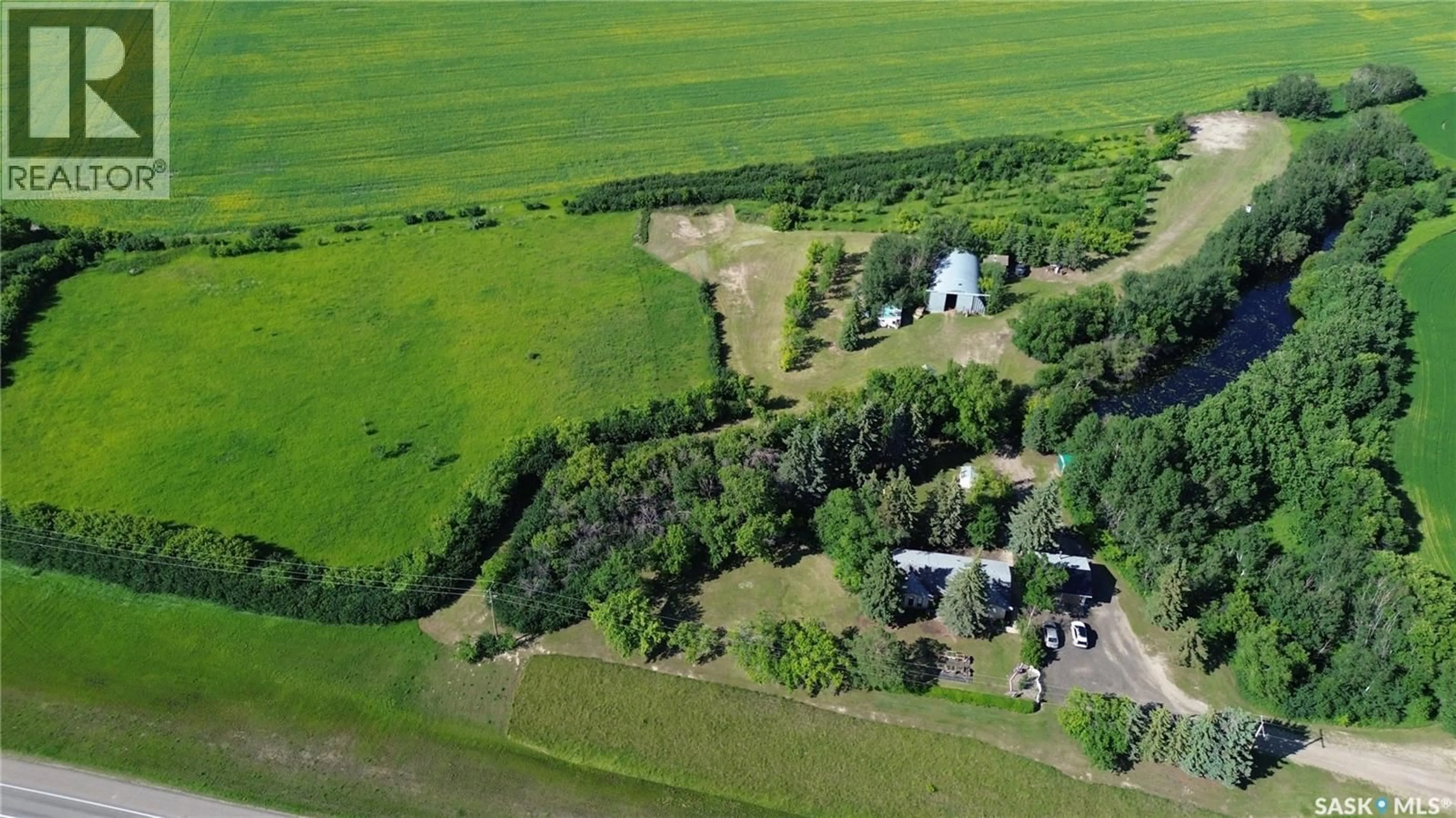 A pic from outside/outdoor area/front of a property/back of a property/a pic from drone, unknown for HIGHWAY 16 ACREAGE, North Battleford Rm No. 437 Saskatchewan S9A2X6