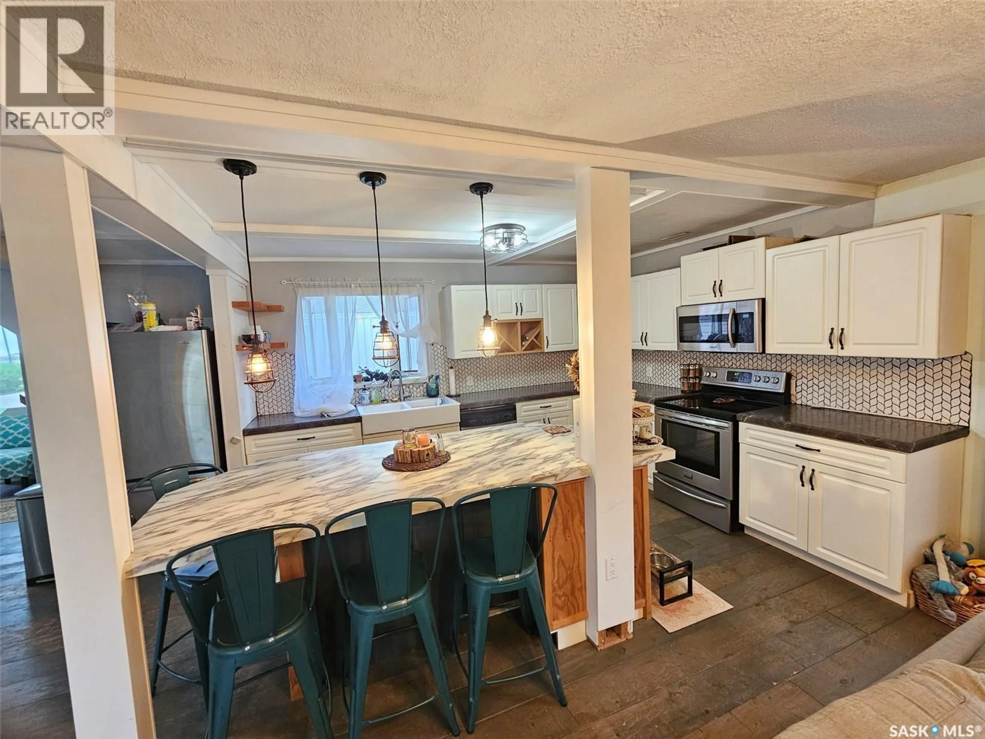 Open concept kitchen, ceramic/tile floor for 306 WEST 1ST STREET, Alida Saskatchewan S0C0B0