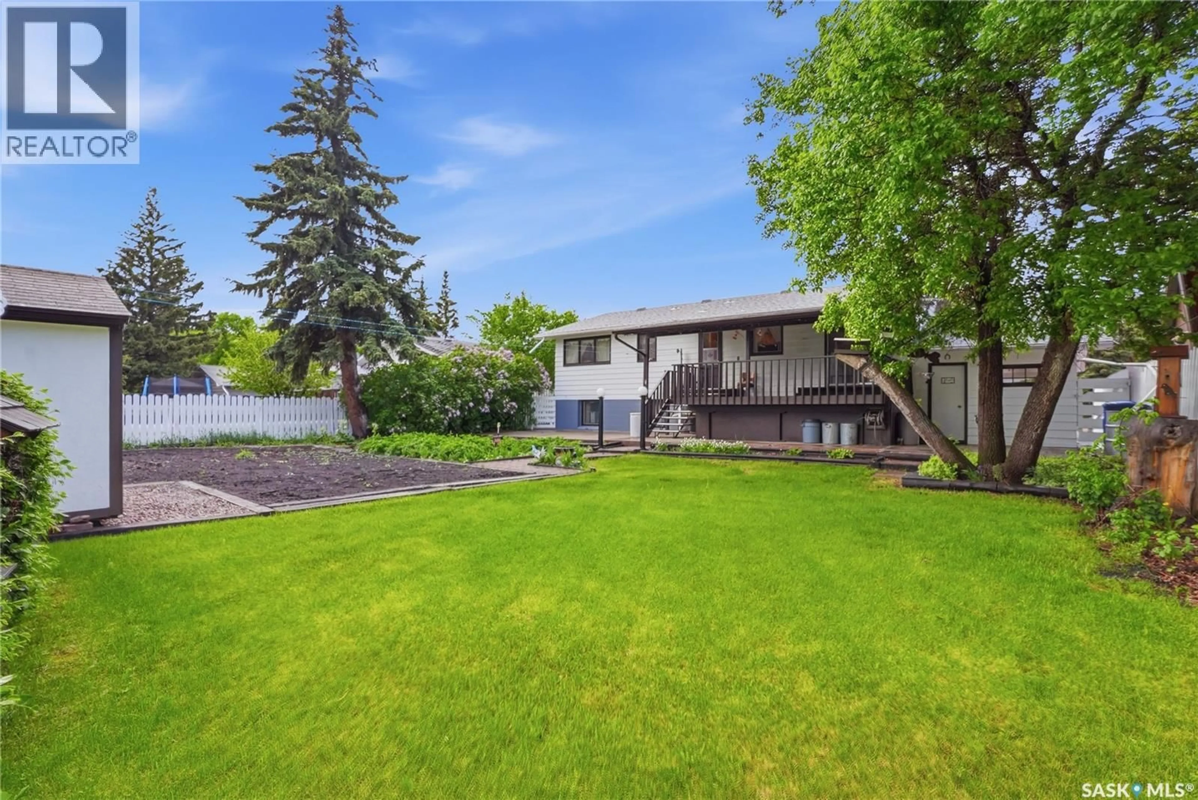 A pic from outside/outdoor area/front of a property/back of a property/a pic from drone, street for 6007 4TH STREET, Rosthern Saskatchewan S0K3R0