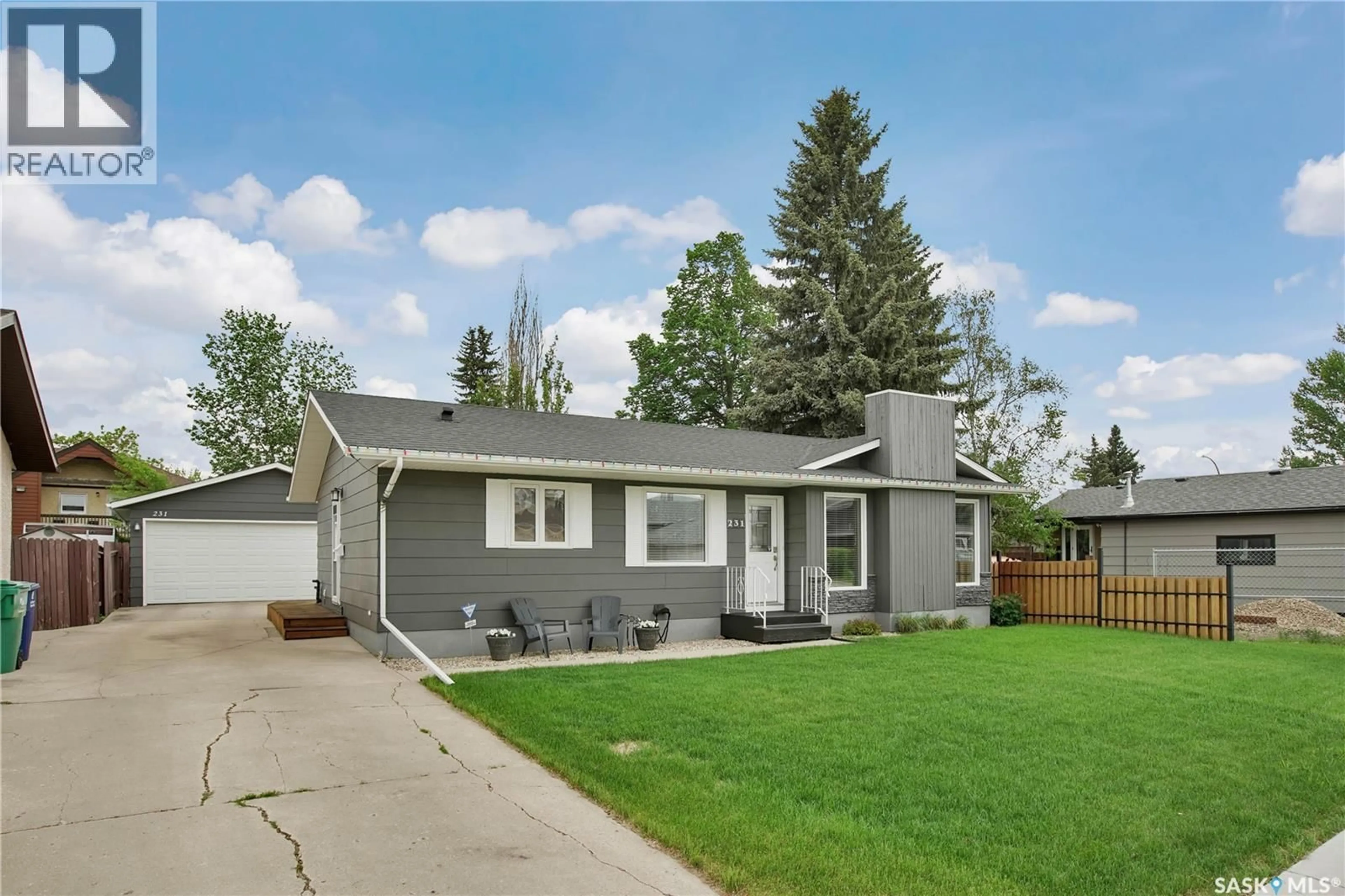 Home with vinyl exterior material, street for 231 ROBORECKI CRESCENT, Saskatoon Saskatchewan S7K5L1