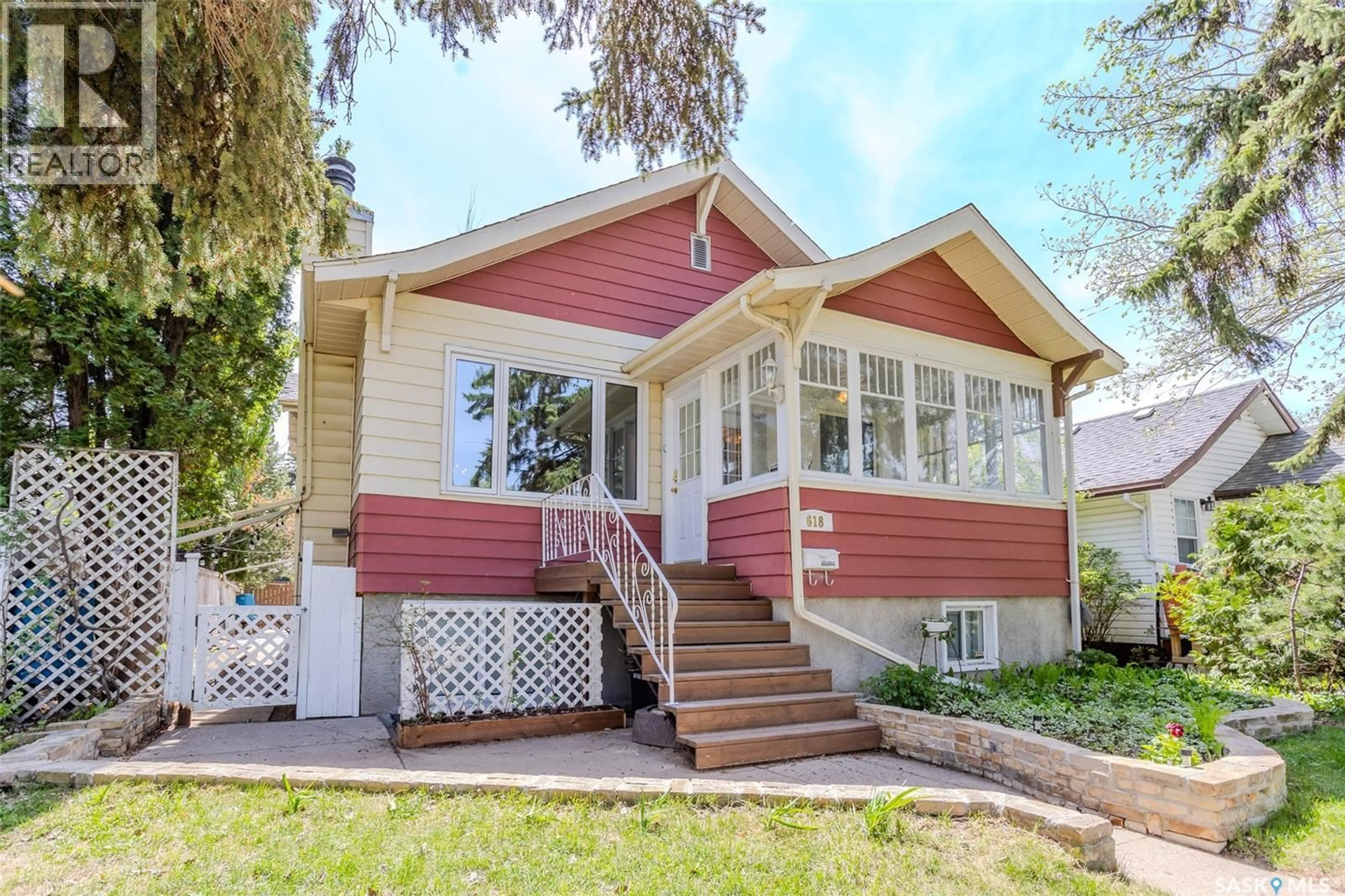 Home with vinyl exterior material, street for 618 3RD STREET, Saskatoon Saskatchewan S7H1M1