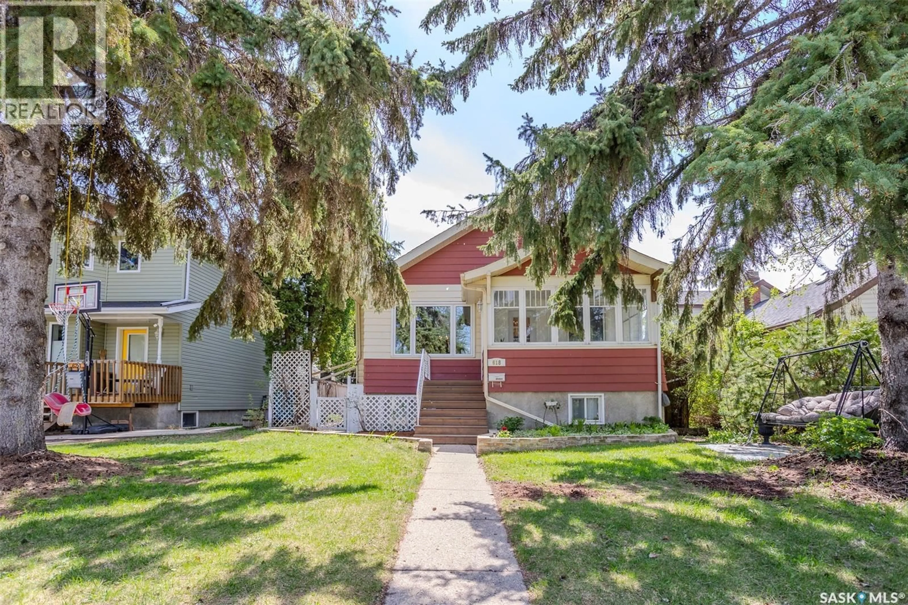 Home with vinyl exterior material, street for 618 3RD STREET, Saskatoon Saskatchewan S7H1M1