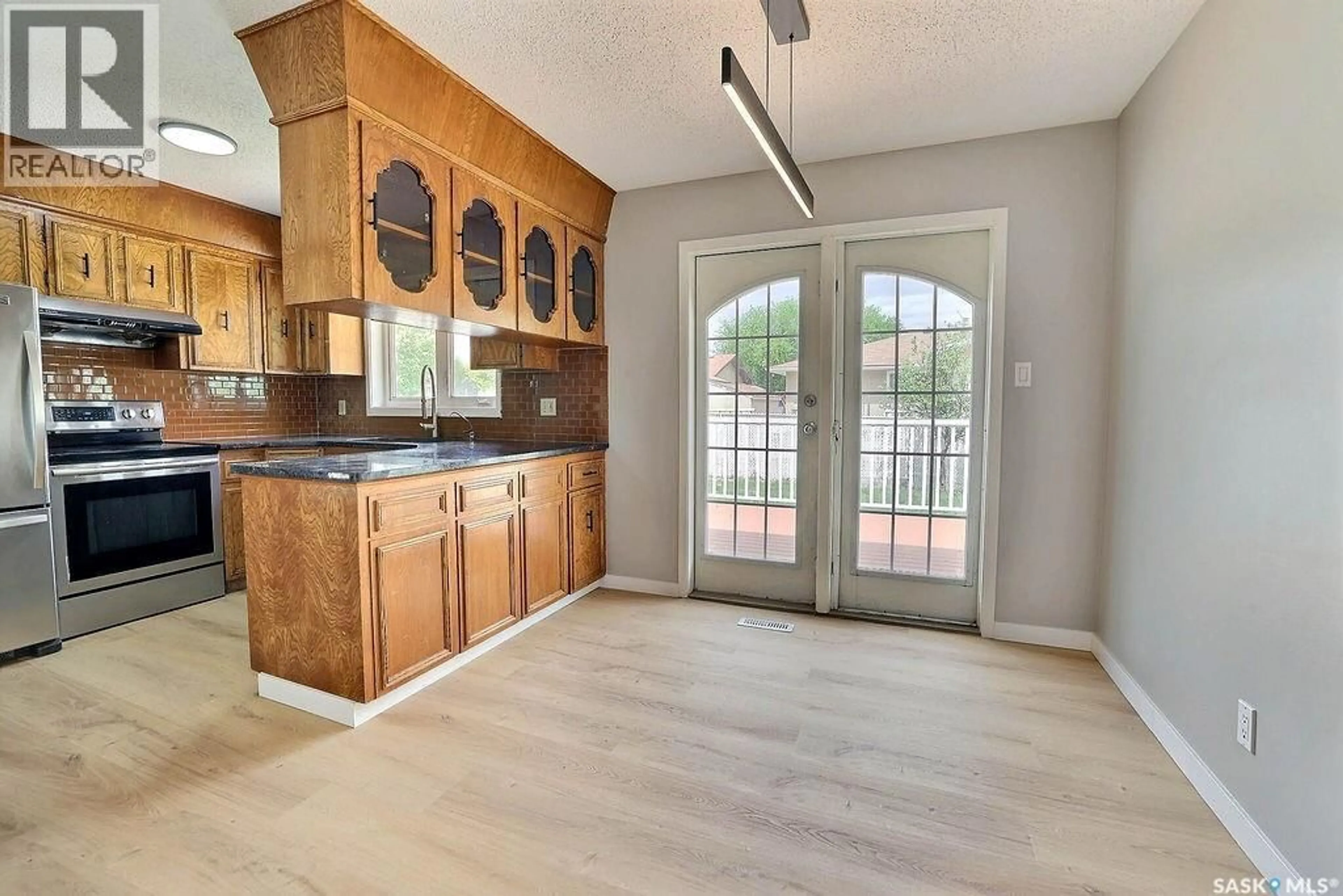 Open concept kitchen, ceramic/tile floor for 35 CHASE CRESCENT, Regina Saskatchewan S4R7Y3