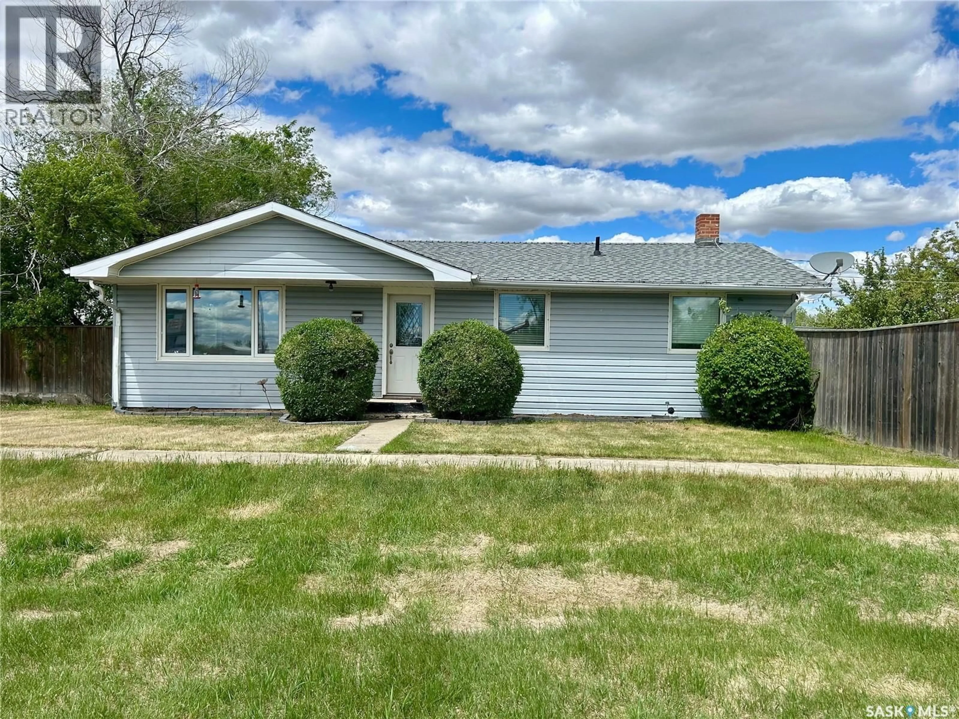 Home with vinyl exterior material, street for 300 MAIN STREET, Lang Saskatchewan S0G2W0