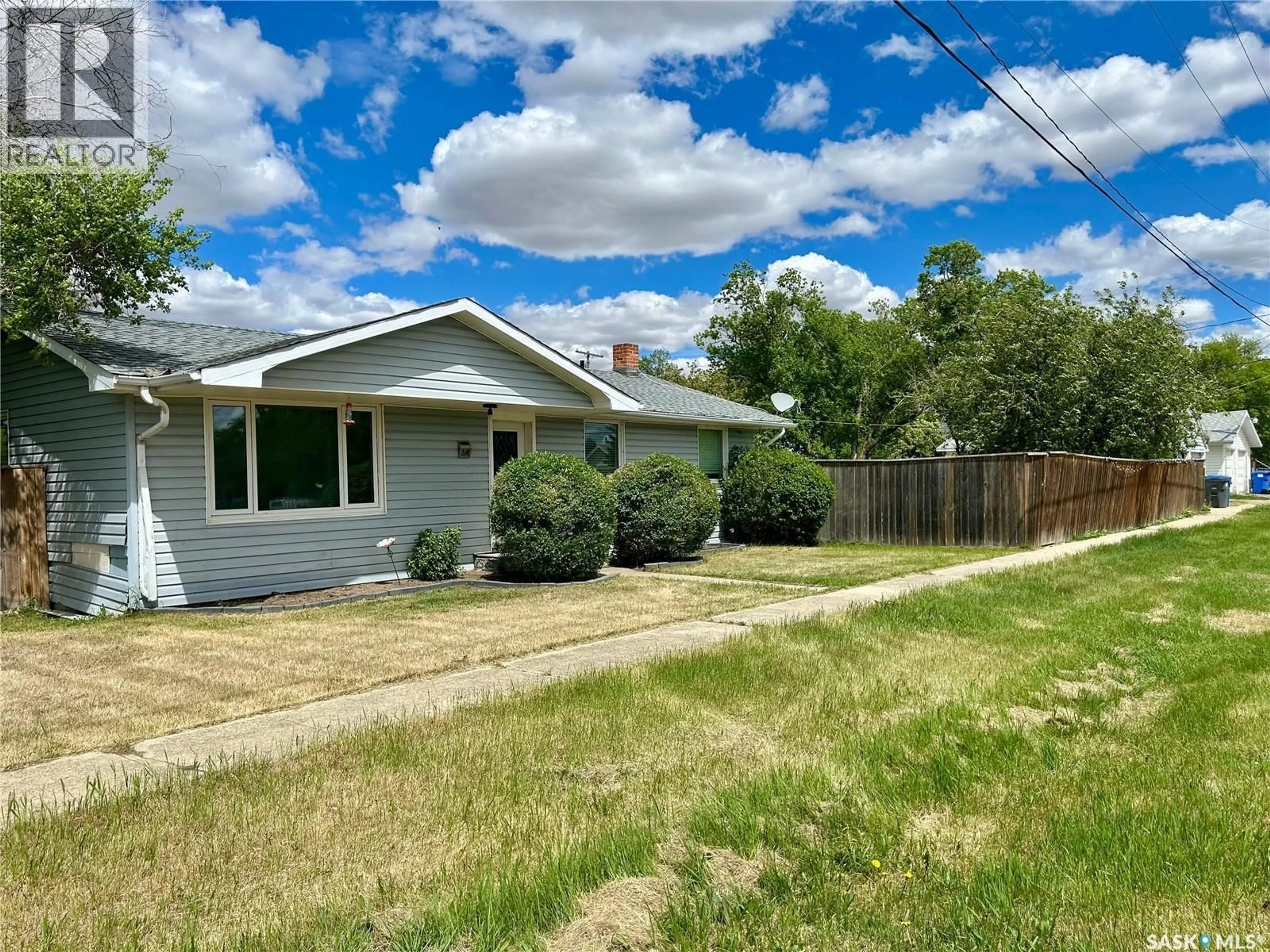 A pic from outside/outdoor area/front of a property/back of a property/a pic from drone, street for 300 MAIN STREET, Lang Saskatchewan S0G2W0