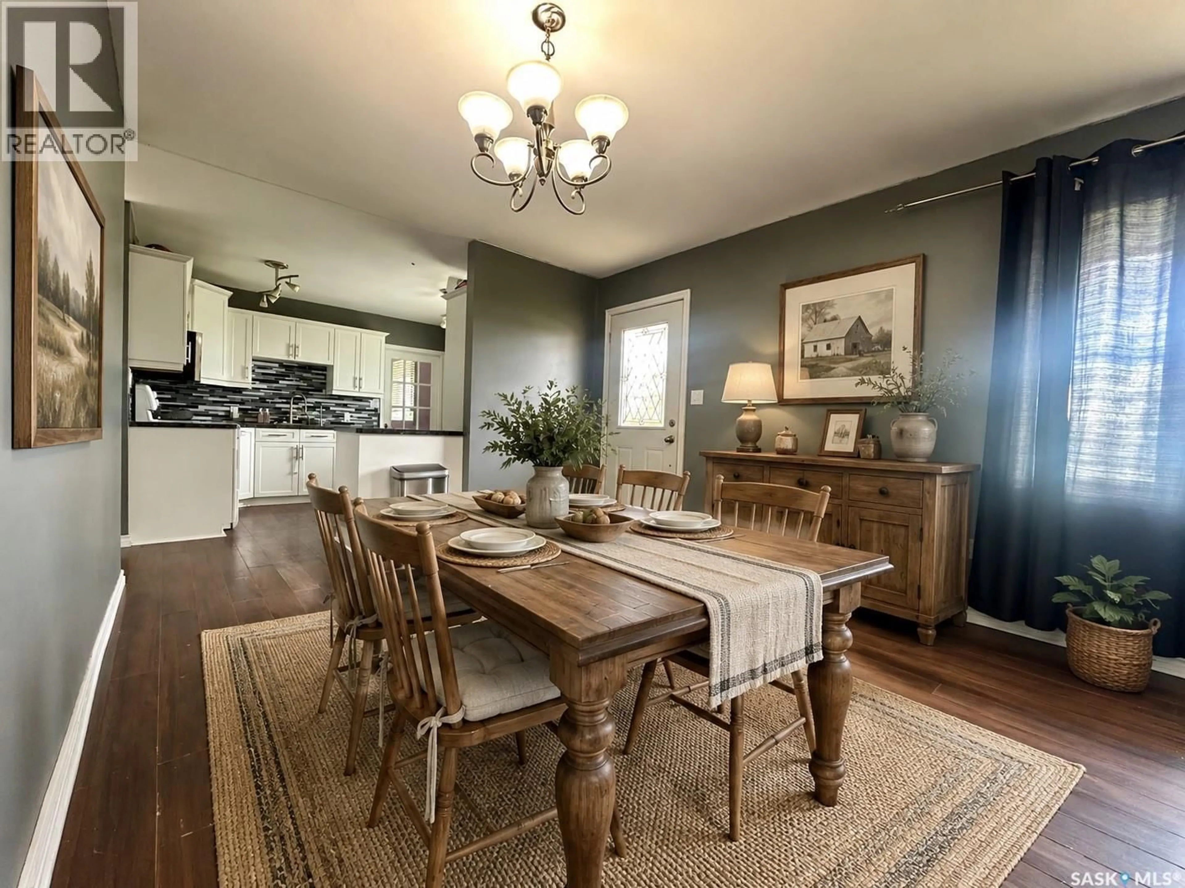 Dining room, wood/laminate floor for 300 MAIN STREET, Lang Saskatchewan S0G2W0
