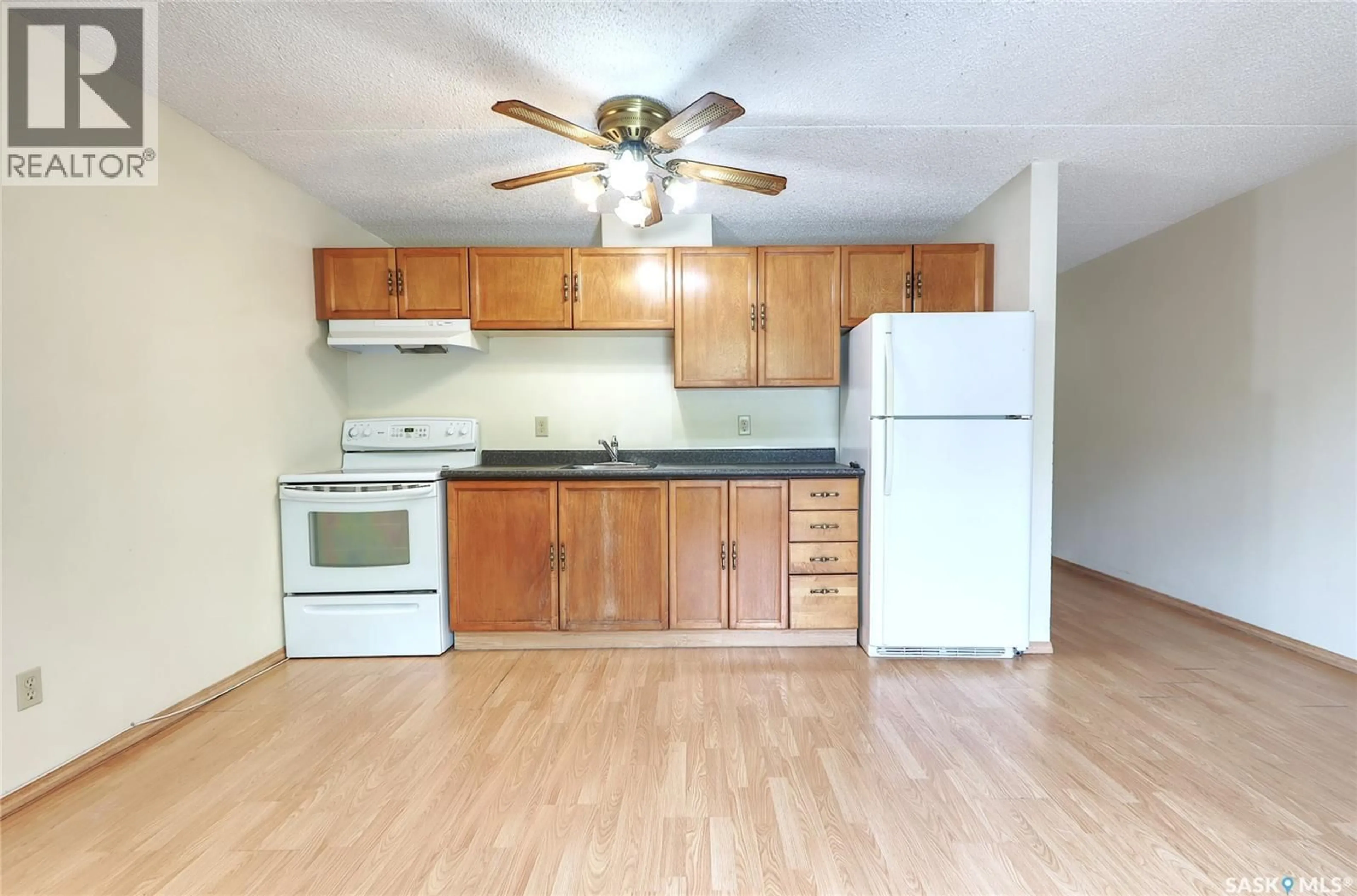 Standard kitchen, wood/laminate floor for 107 - 2125 OSLER STREET, Regina Saskatchewan S4P4G9