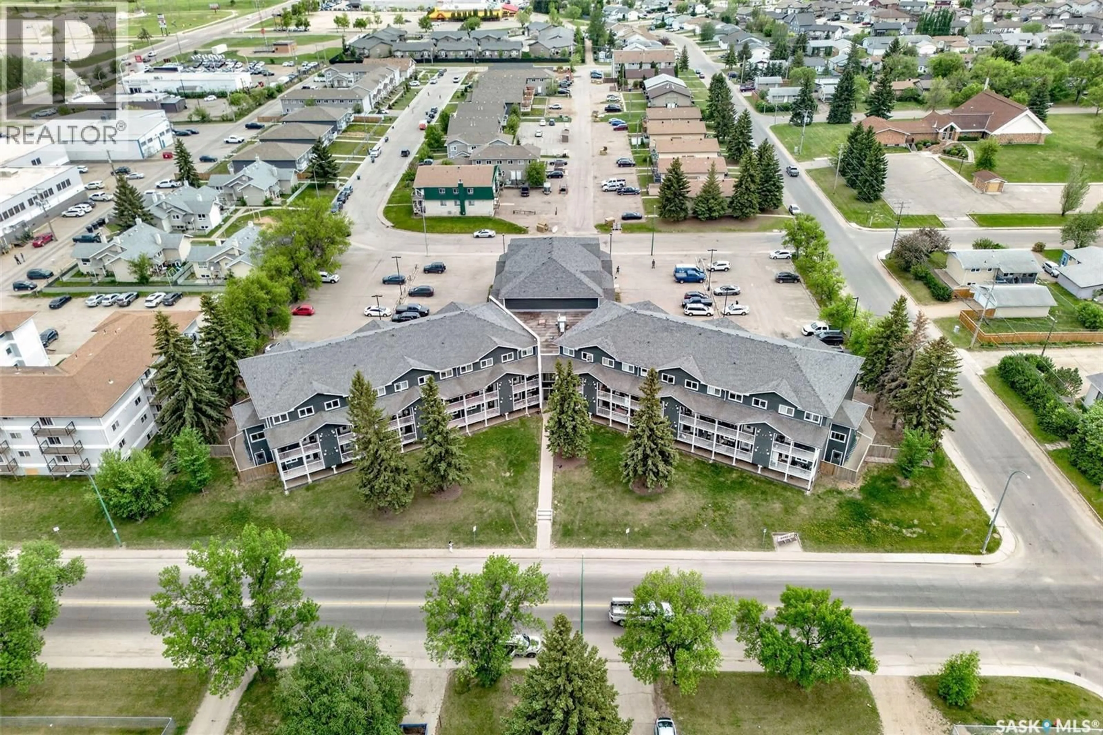 A pic from outside/outdoor area/front of a property/back of a property/a pic from drone, unknown for E - 109 515 28TH STREET, Prince Albert Saskatchewan S6V1X8