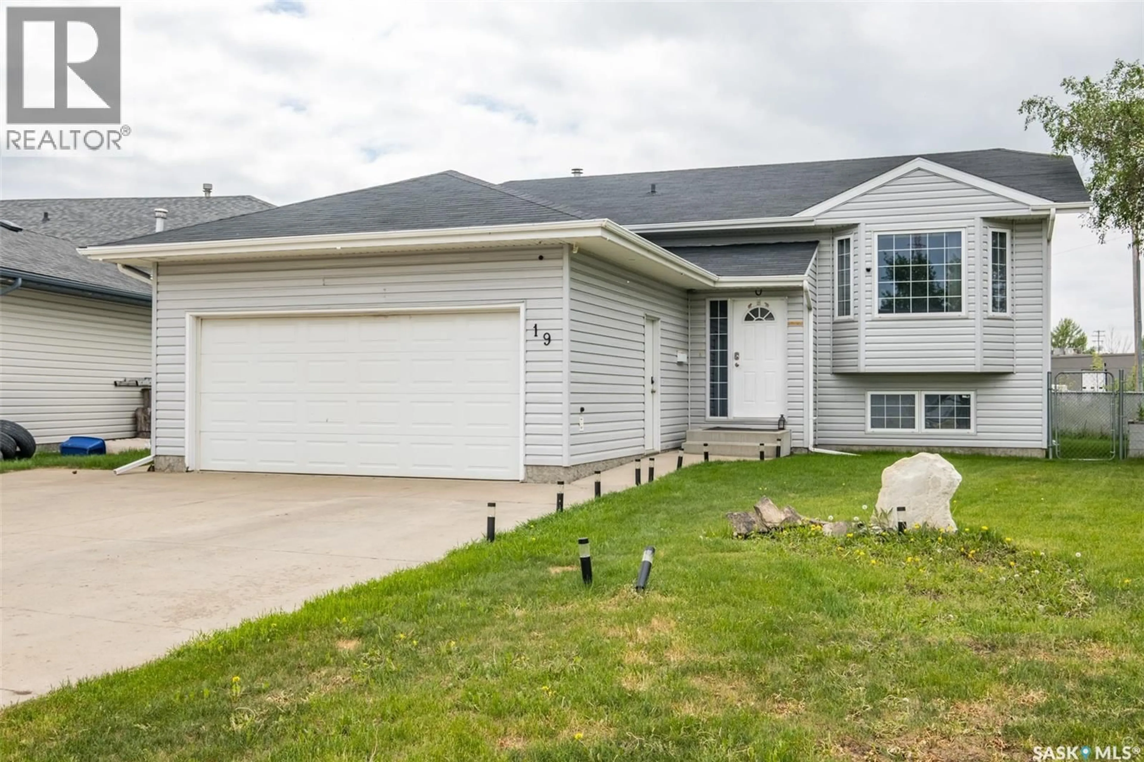Home with vinyl exterior material, street for 19 MOONEY PLACE, Prince Albert Saskatchewan S6V8C4