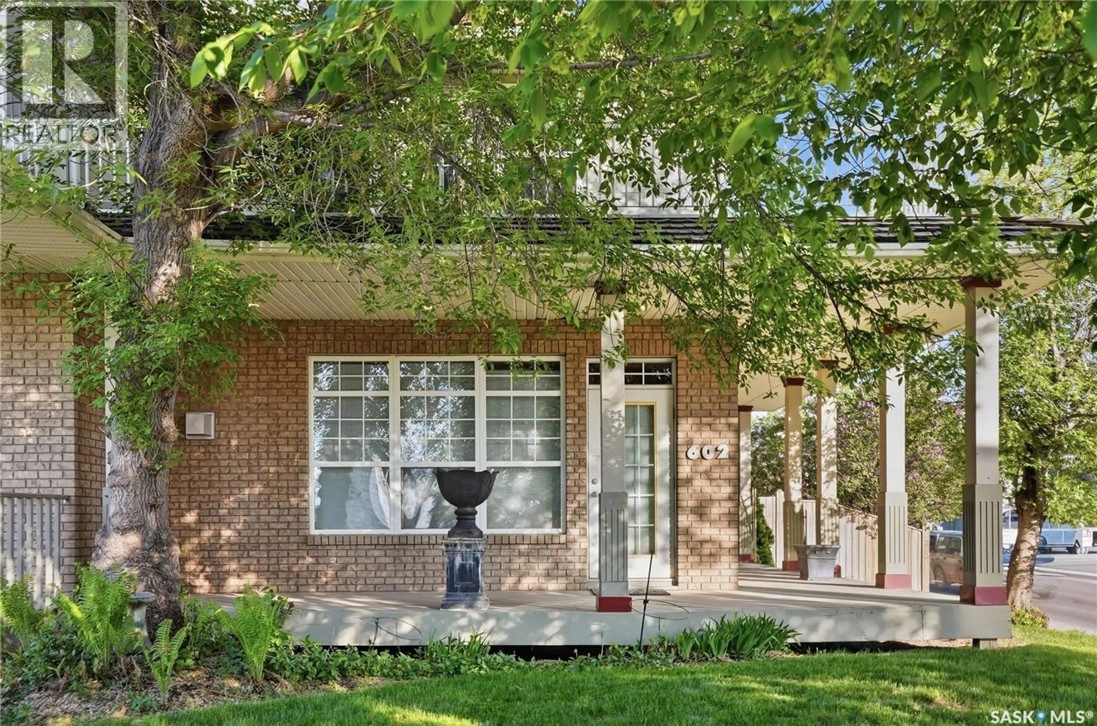 Home with brick exterior material, street for E - 602 SASKATCHEWAN CRESCENT, Saskatoon Saskatchewan S7N0K9
