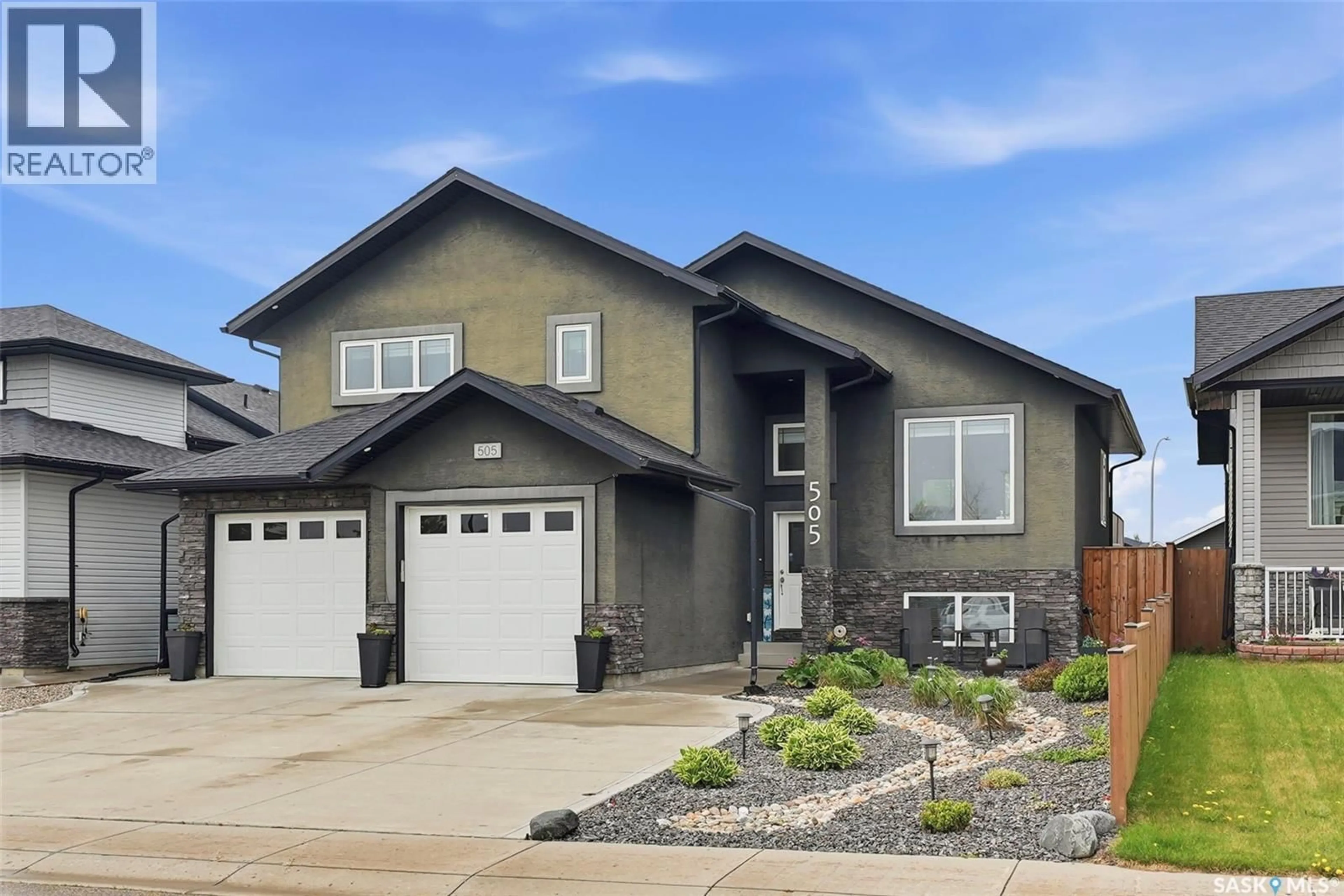 Home with vinyl exterior material, street for 505 SILVER BIRCH LANE, Warman Saskatchewan S0K4S2