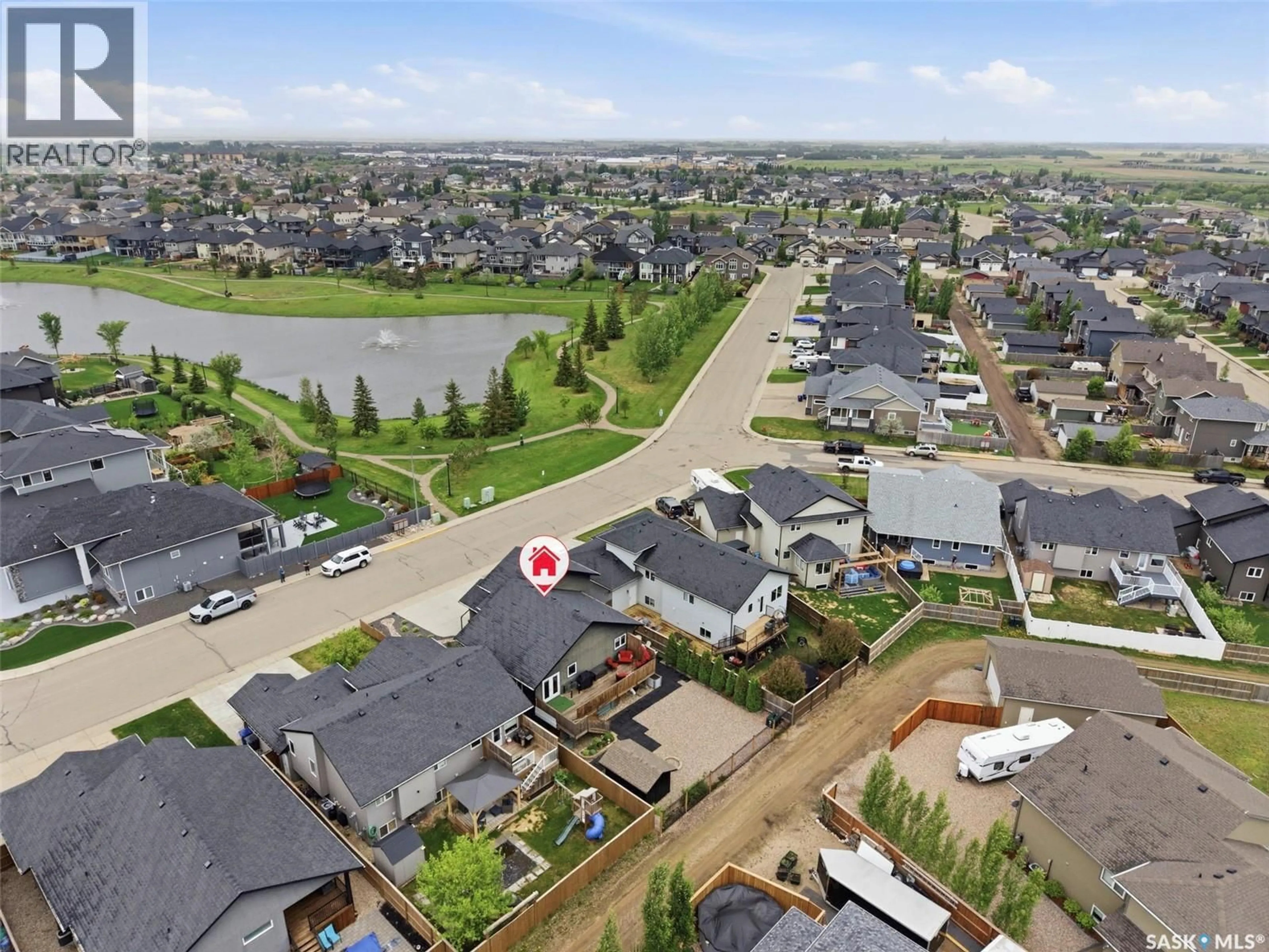 A pic from outside/outdoor area/front of a property/back of a property/a pic from drone, unknown for 505 SILVER BIRCH LANE, Warman Saskatchewan S0K4S2