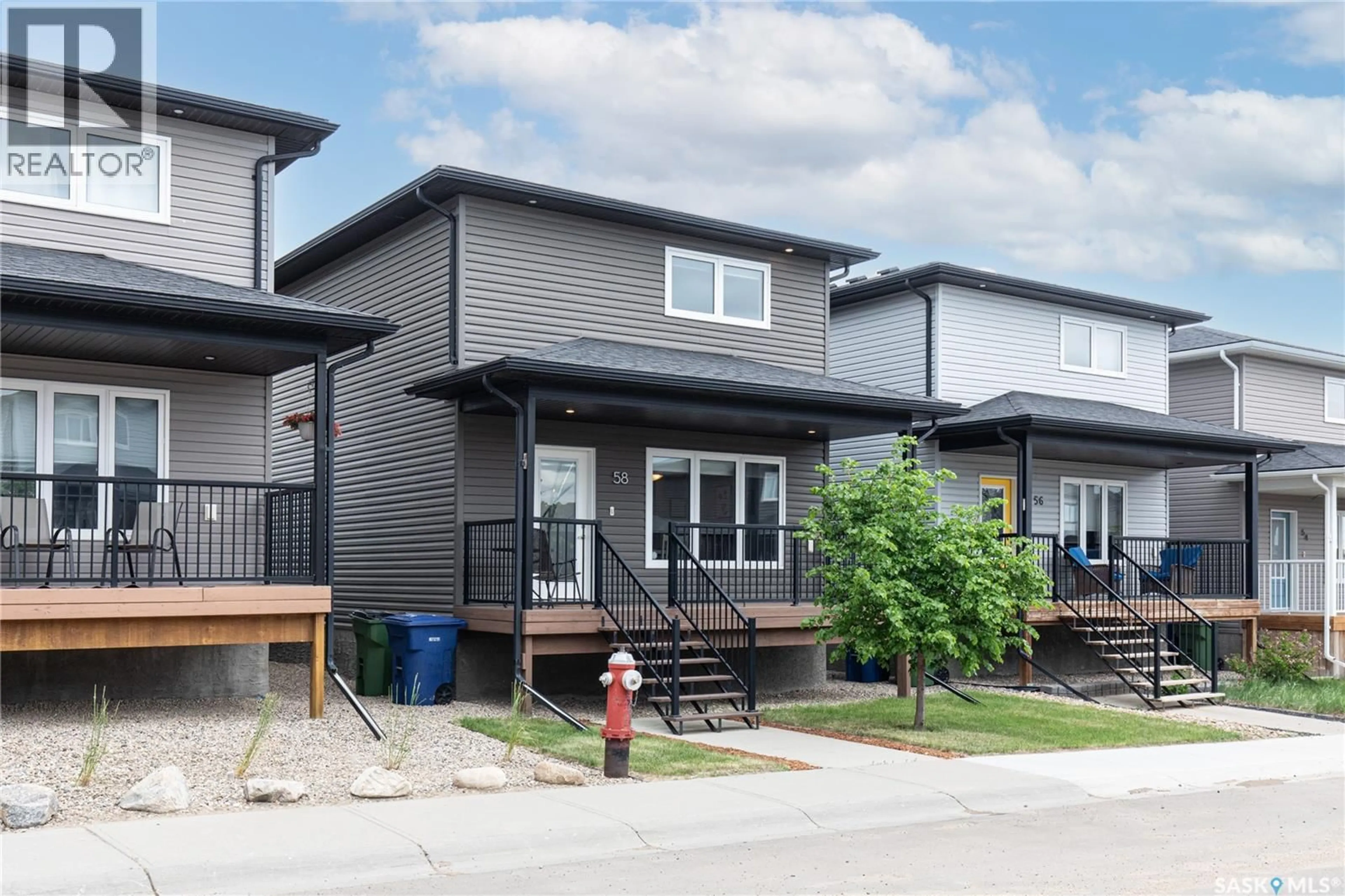 Home with vinyl exterior material, street for 58 BRIGHAM ROAD, Moose Jaw Saskatchewan S6K0A7