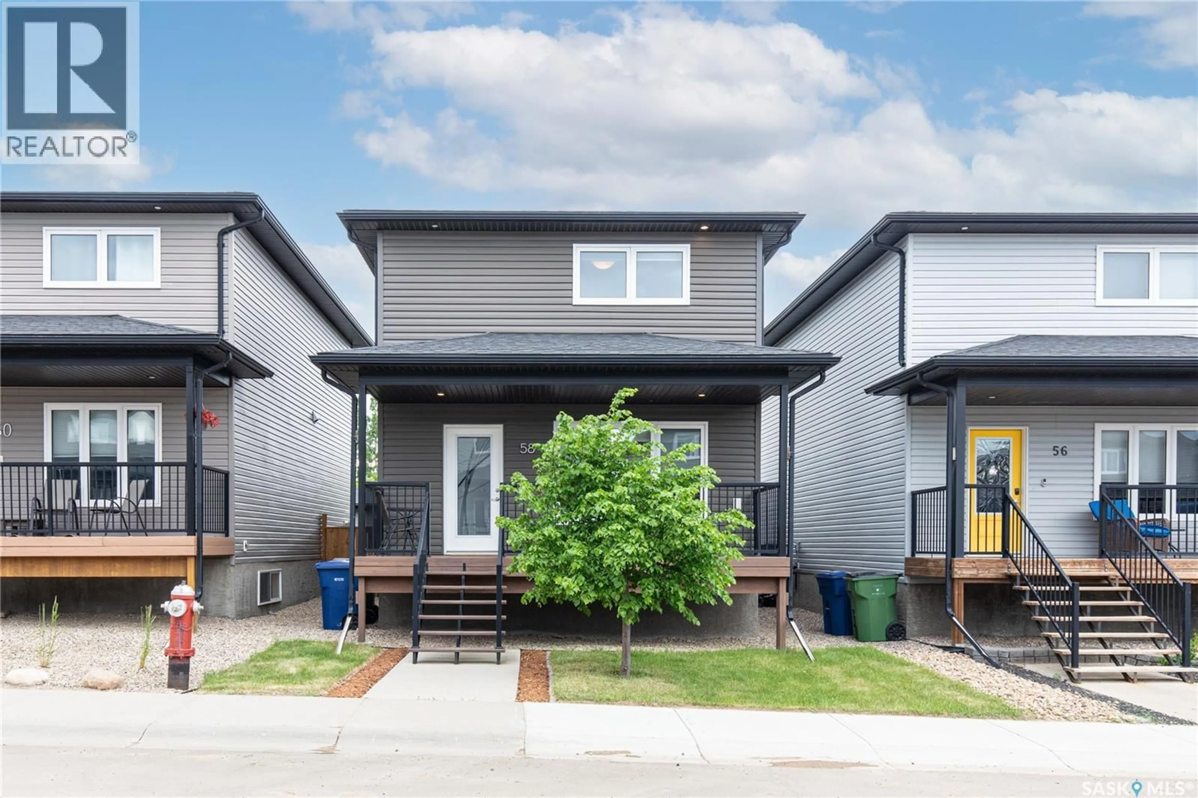 Home with vinyl exterior material, street for 58 BRIGHAM ROAD, Moose Jaw Saskatchewan S6K0A7
