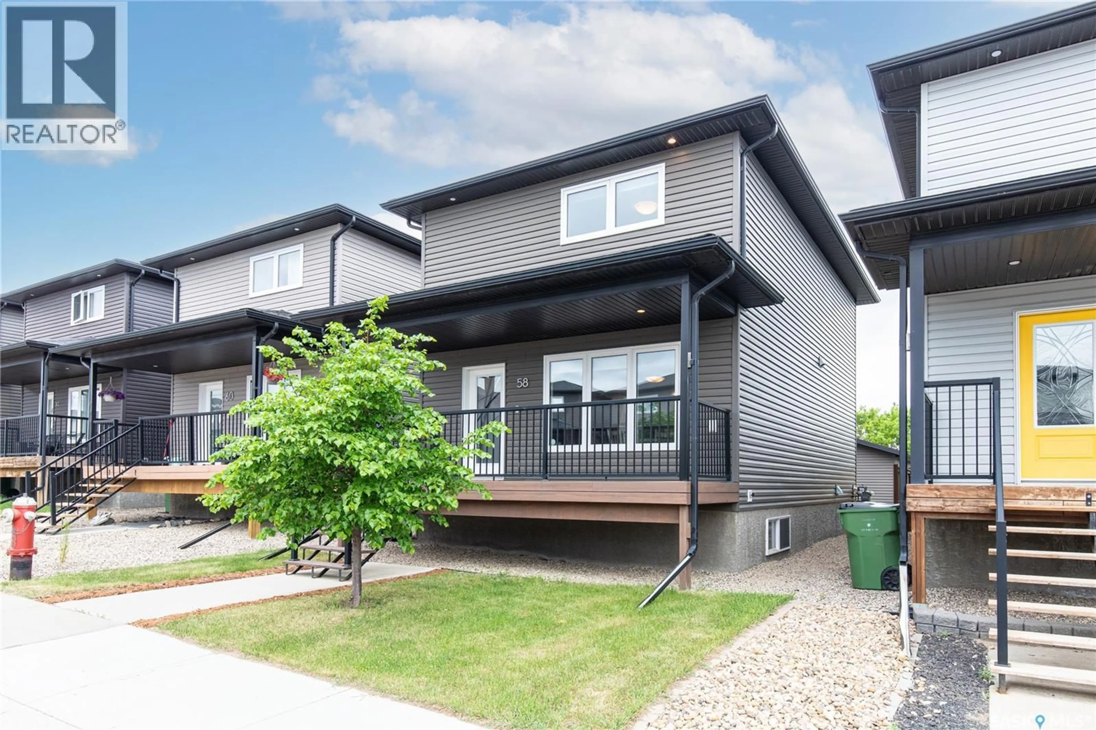 Home with vinyl exterior material, street for 58 BRIGHAM ROAD, Moose Jaw Saskatchewan S6K0A7